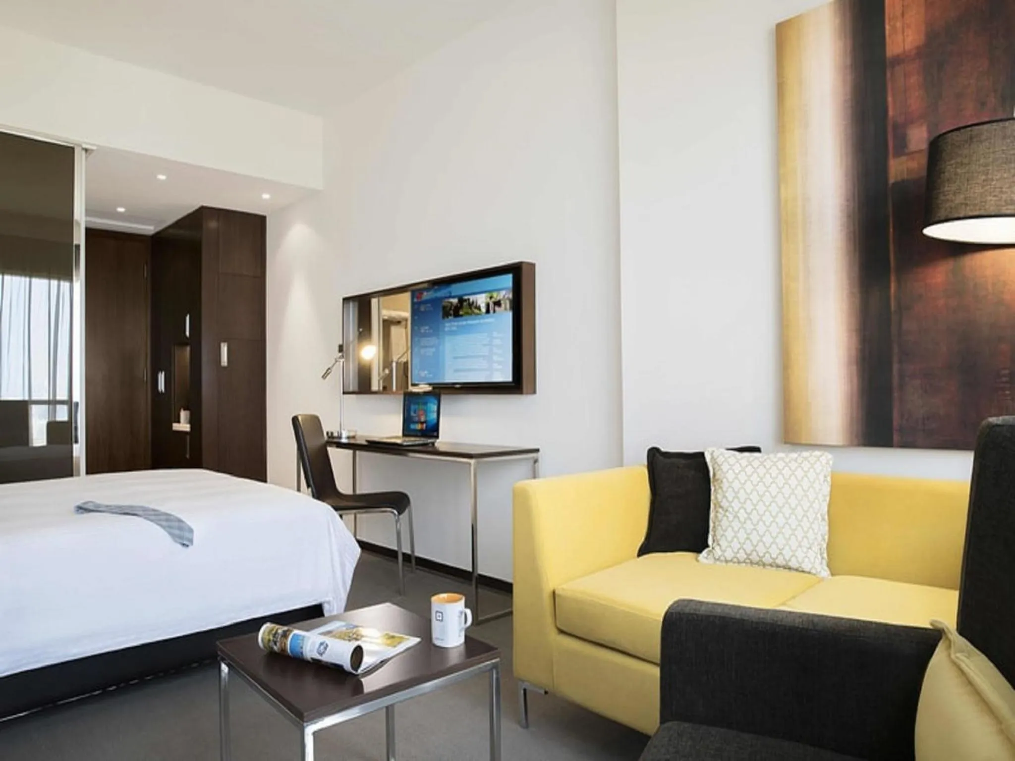 Seating area, Bed in Centro Waha by Rotana