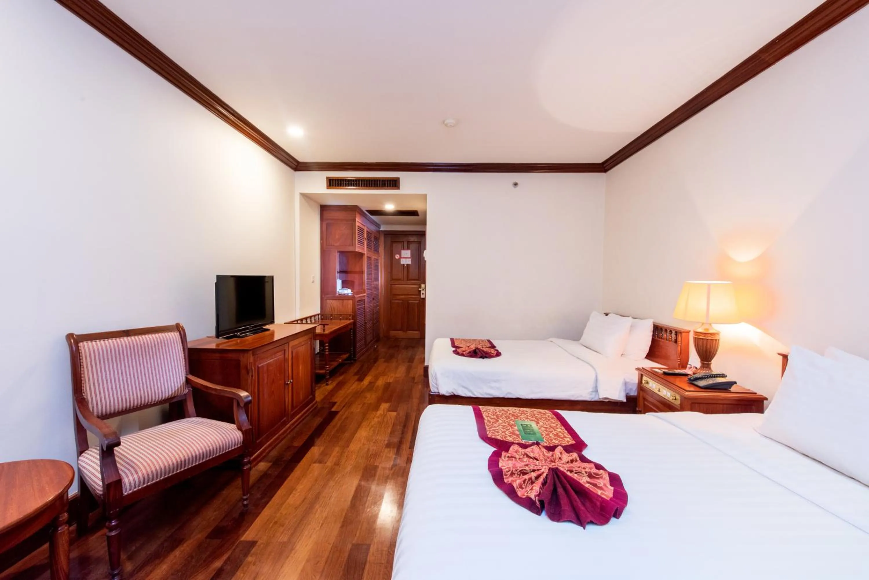 Photo of the whole room, Bed in Steung Siemreap Hotel