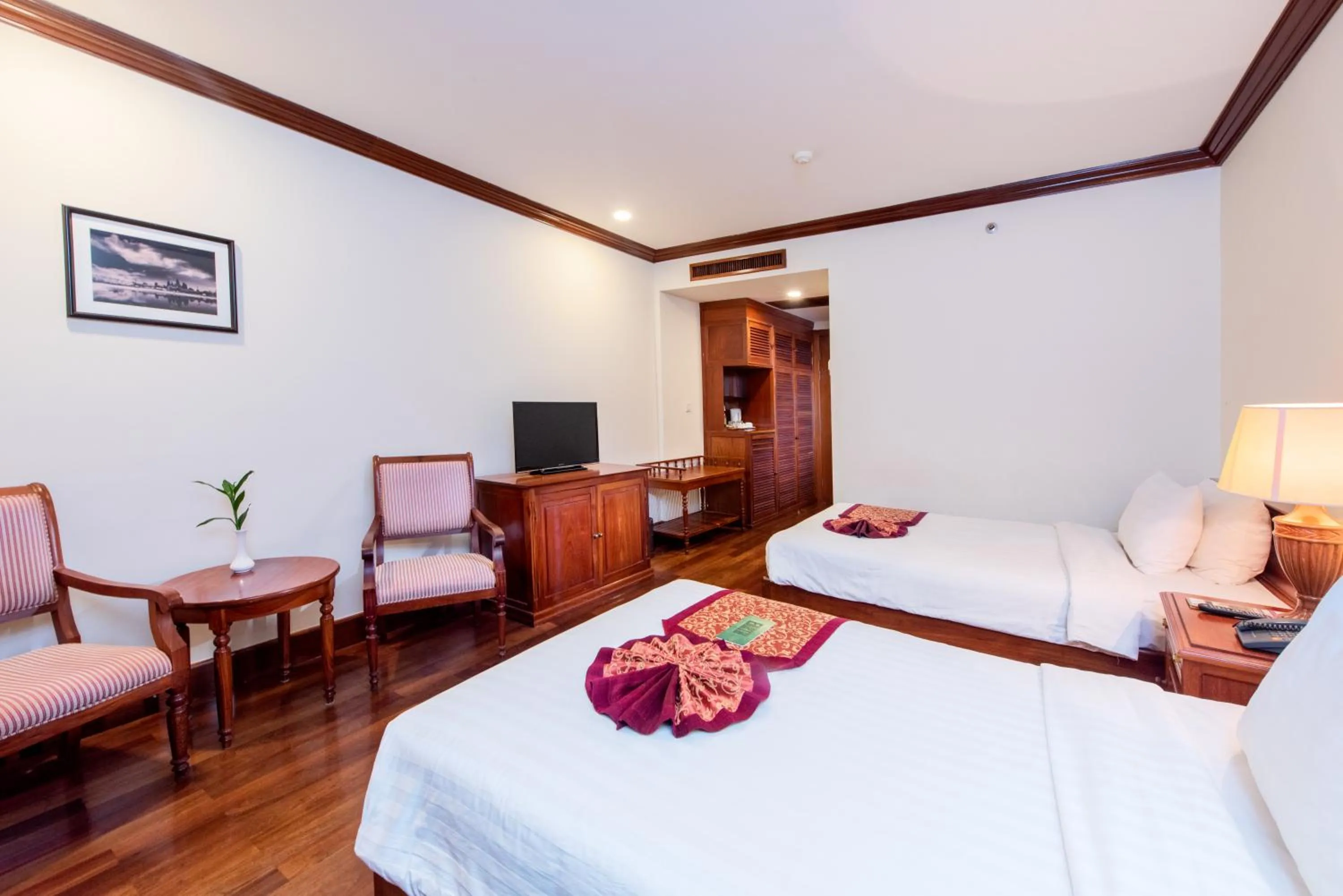 Photo of the whole room, Bed in Steung Siemreap Hotel