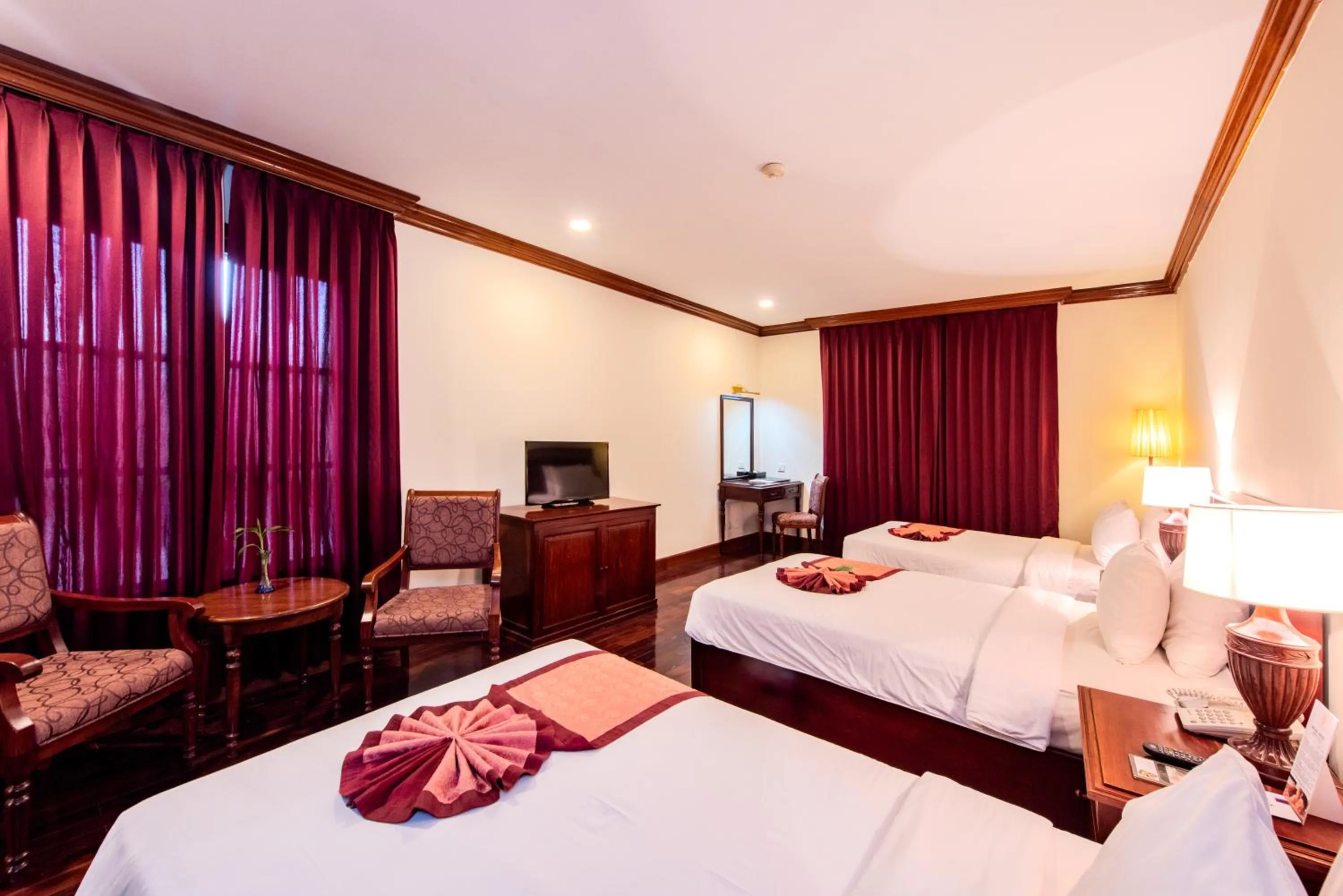Photo of the whole room, Bed in Steung Siemreap Hotel