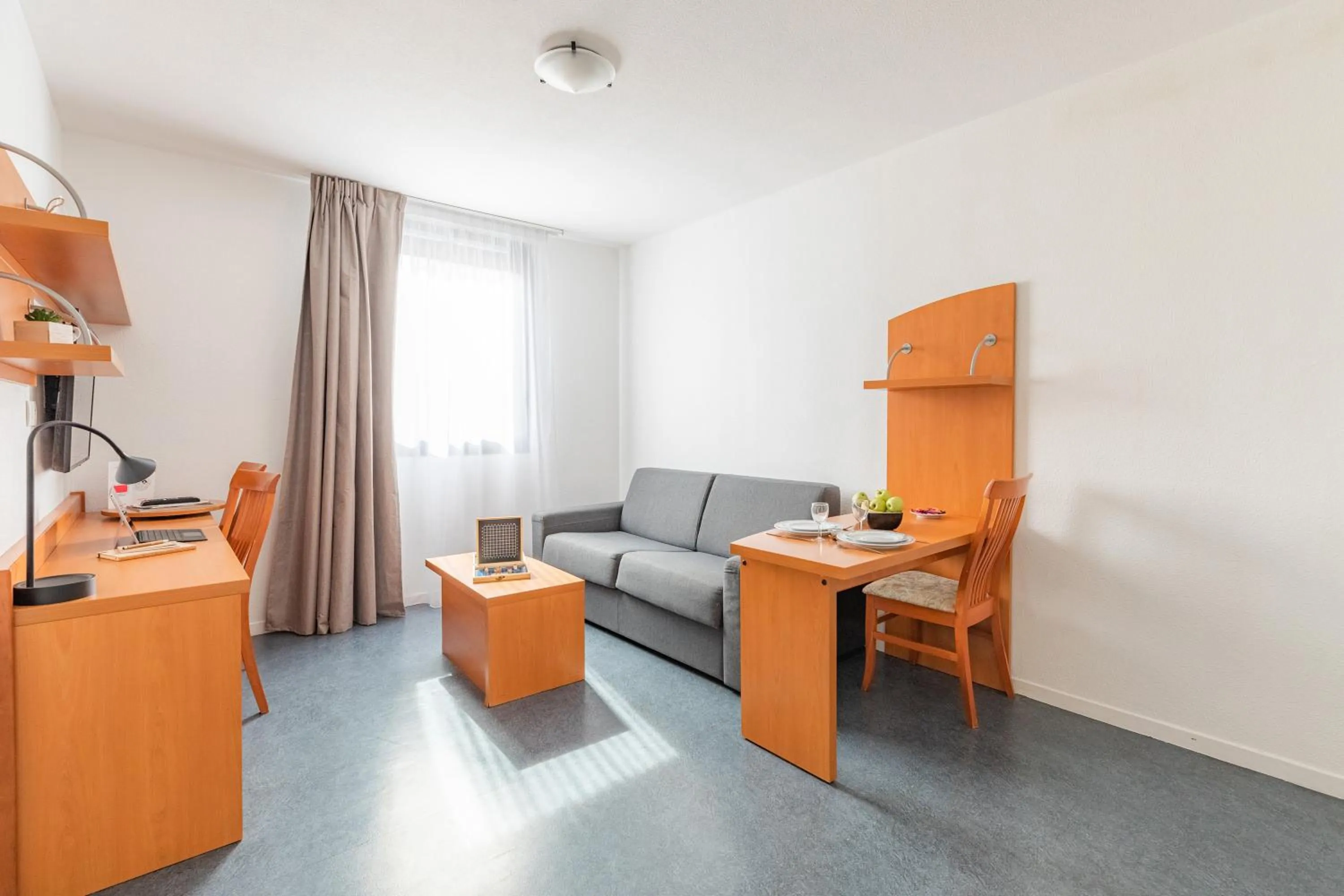 Seating area in Appart’City Confort Lyon Gerland