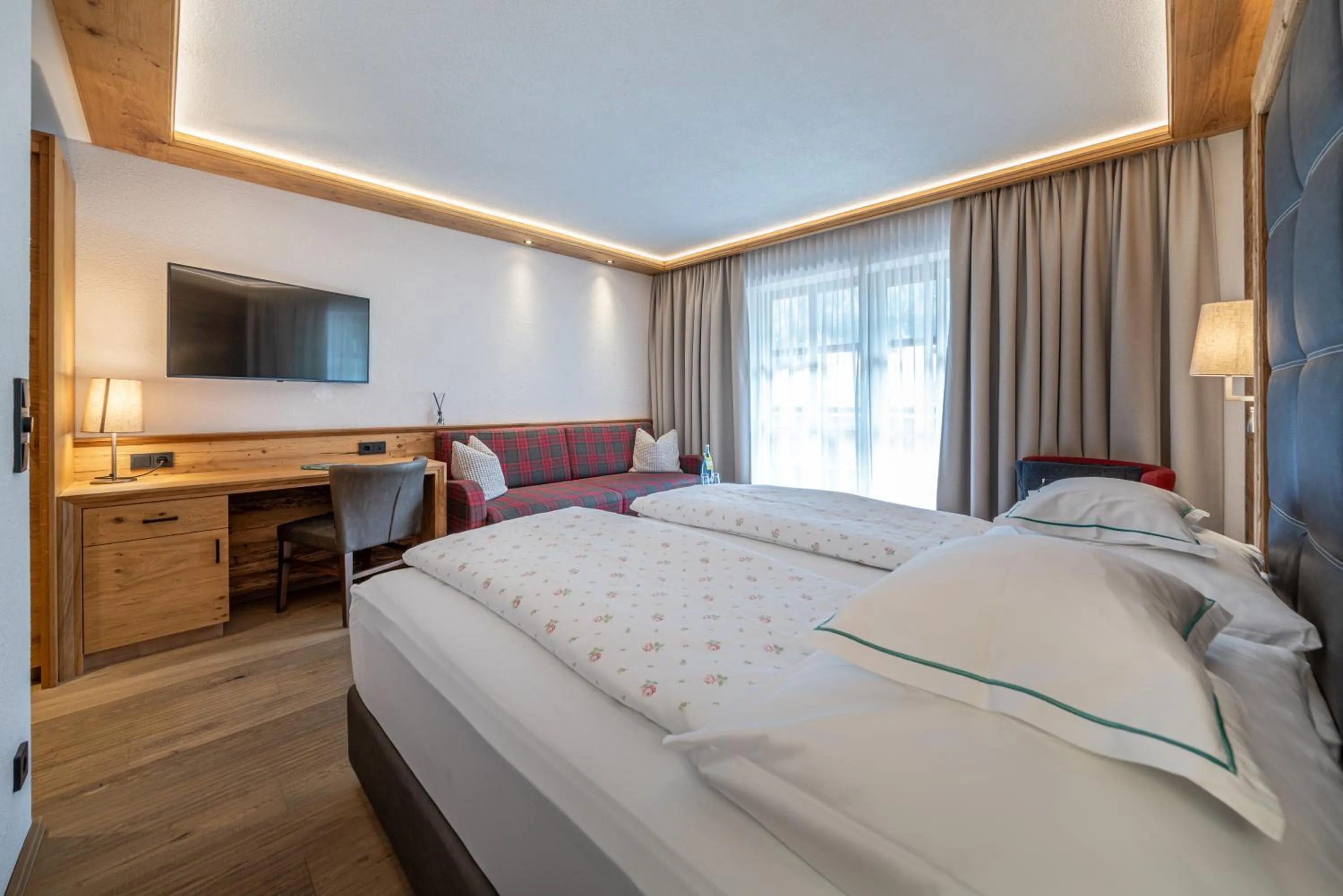 Photo of the whole room, Bed in Natur-&Alpinhotel Post