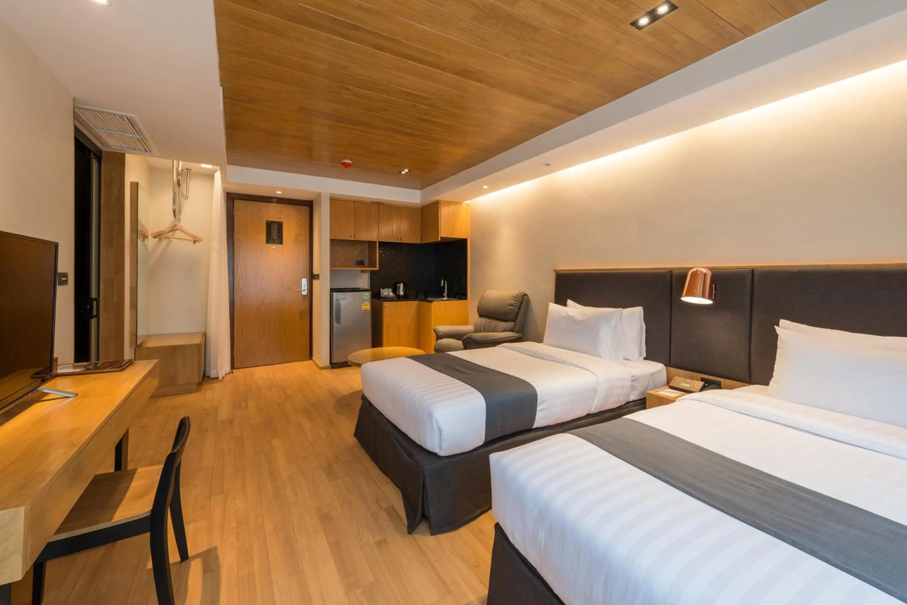 Photo of the whole room, Bed in Asana Hotel & Residence