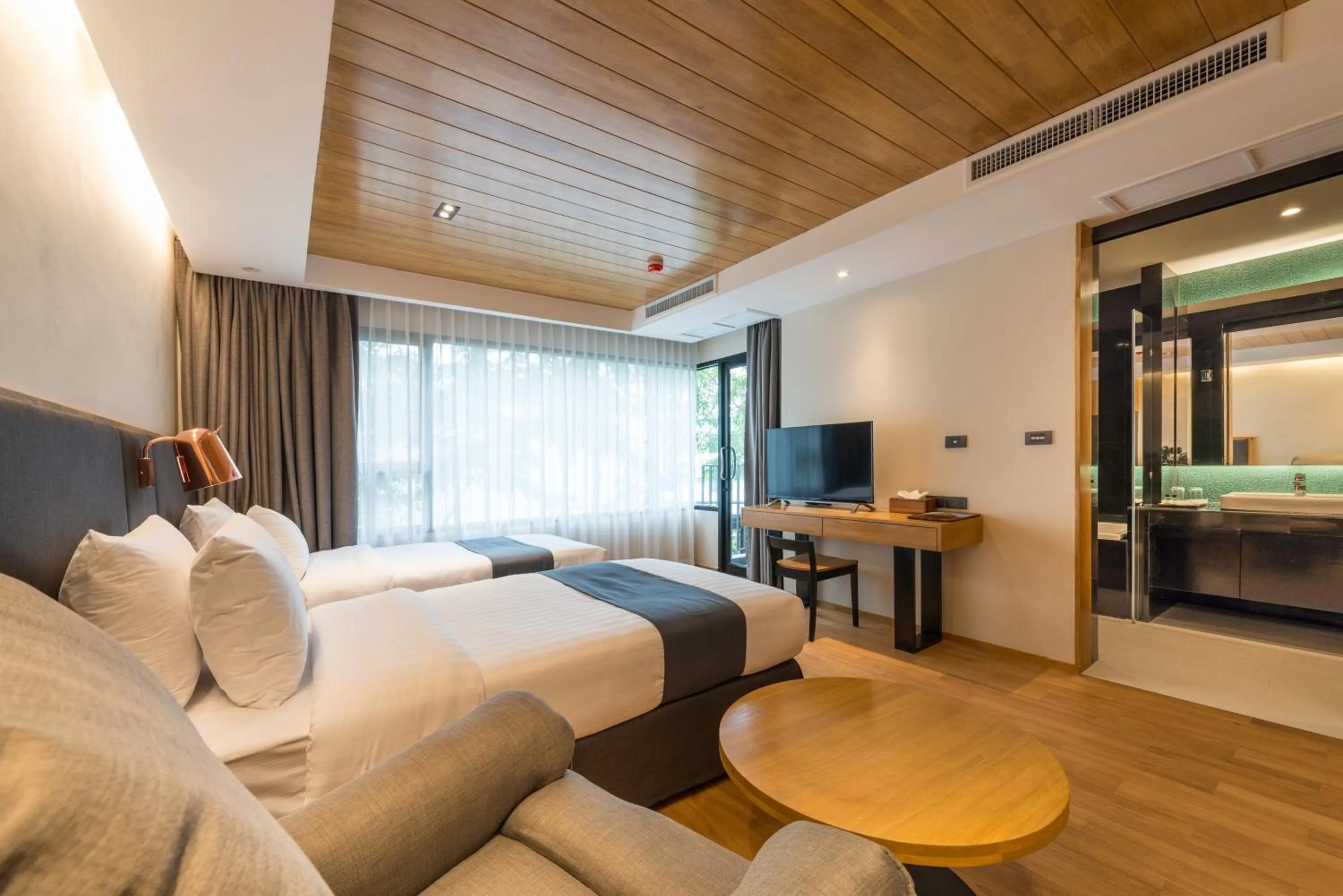 Photo of the whole room, Bed in Asana Hotel & Residence