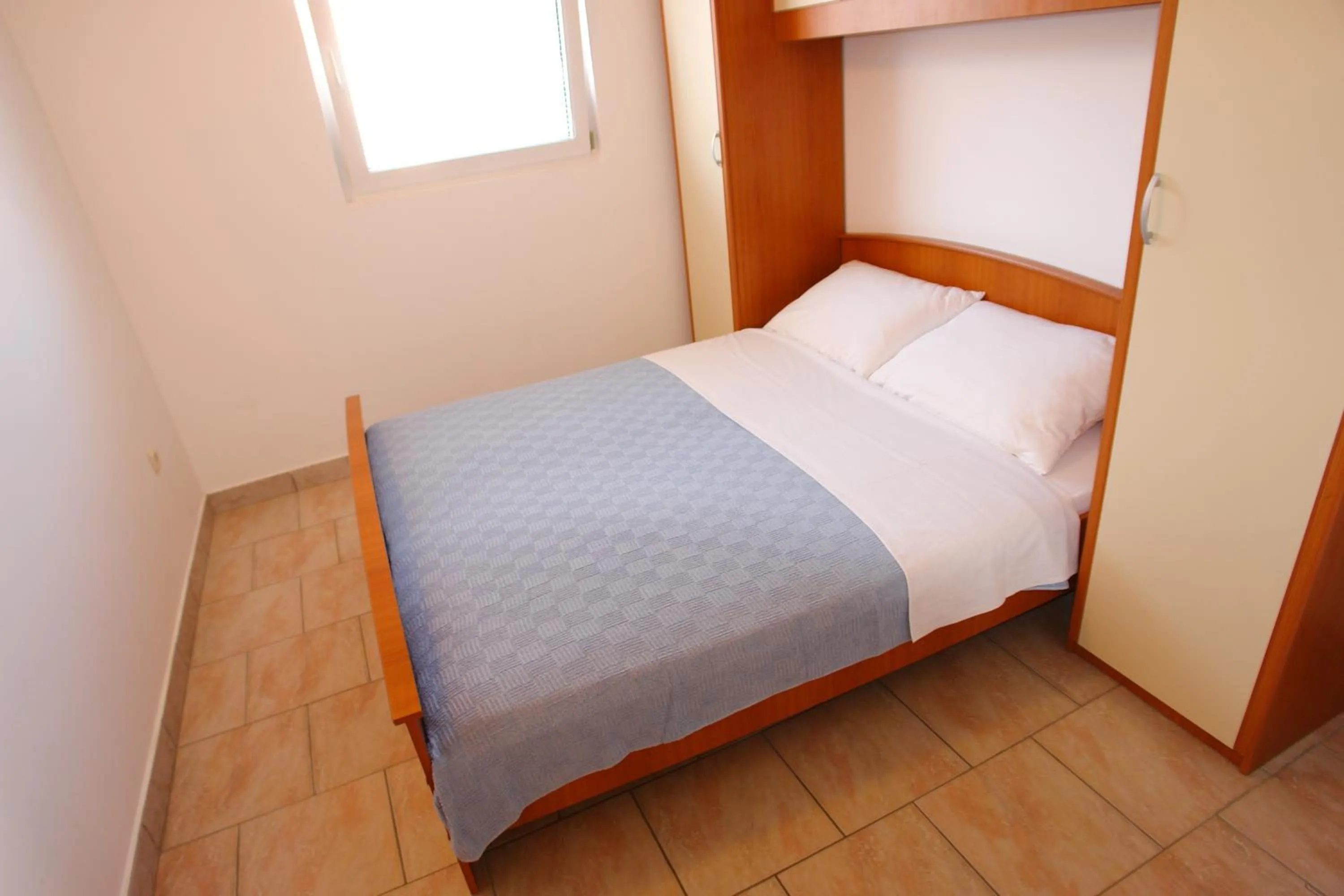 Bed in Apartments Andro