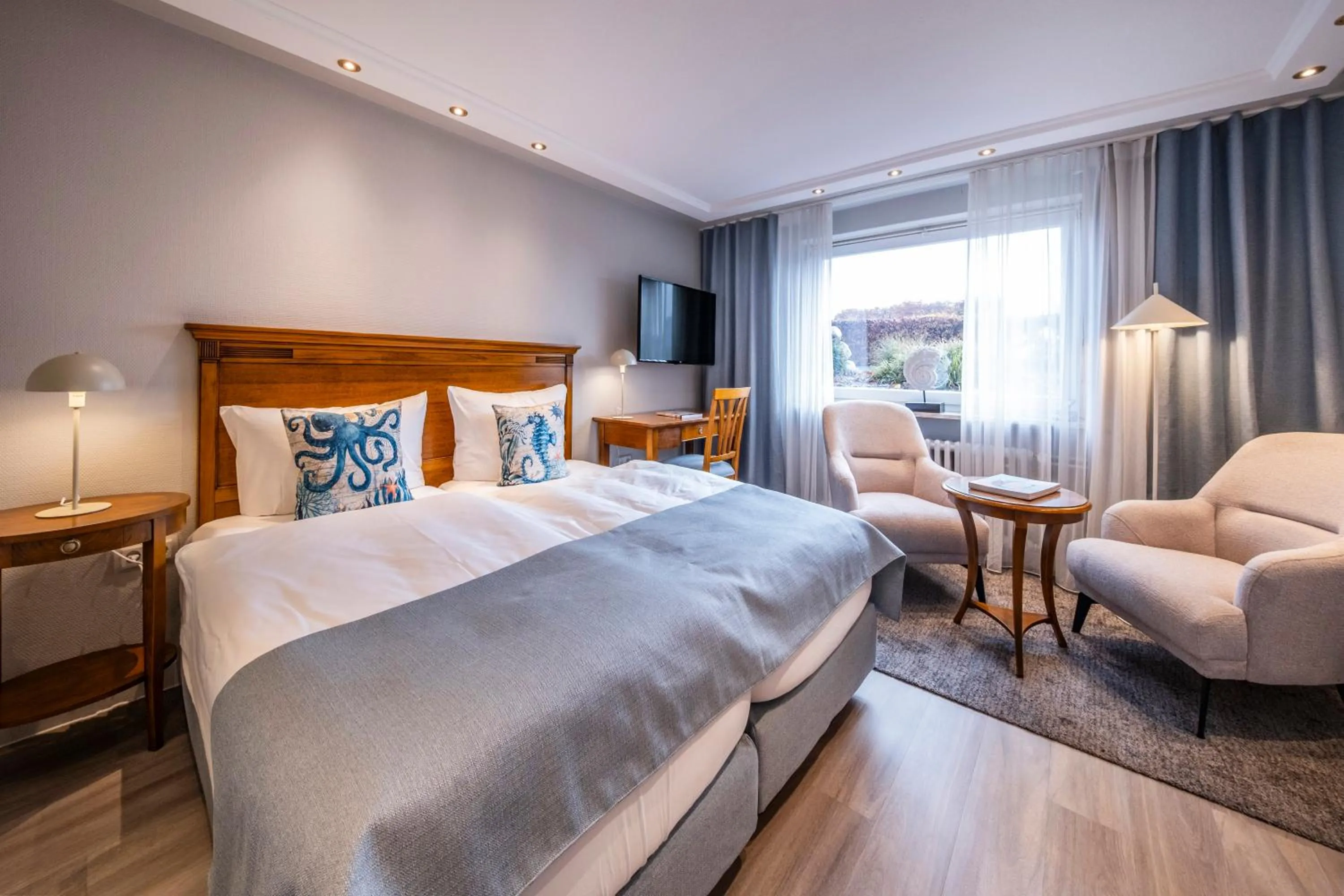 Photo of the whole room, Bed in Büngers Apartment-Hotel mit Gartensauna - modern, gemütlich und strandnah