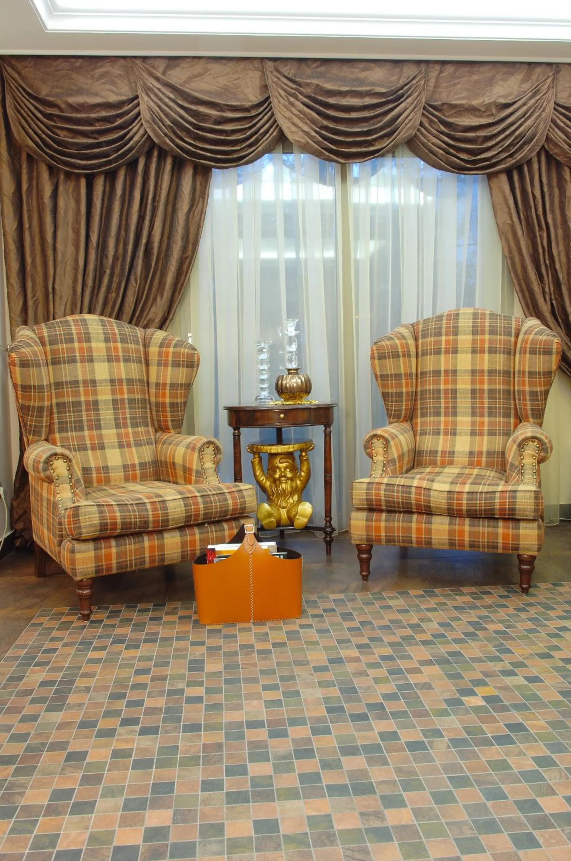 Communal lounge/ TV room in Olympic Fashion Hotels