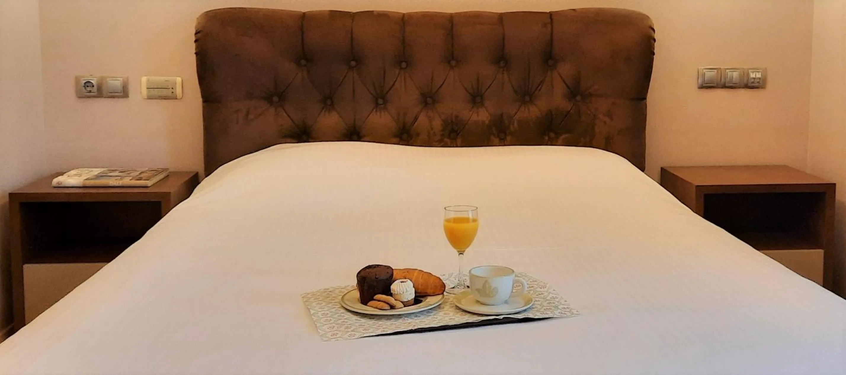 Bed in Olympic Fashion Hotels