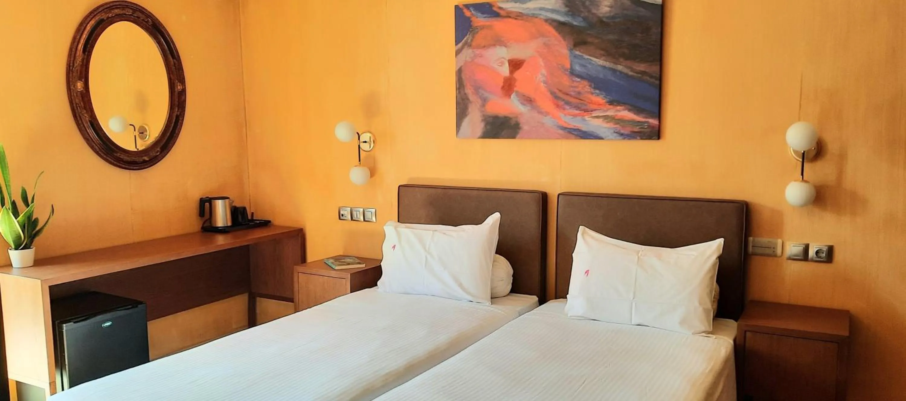 Bed in Olympic Fashion Hotels