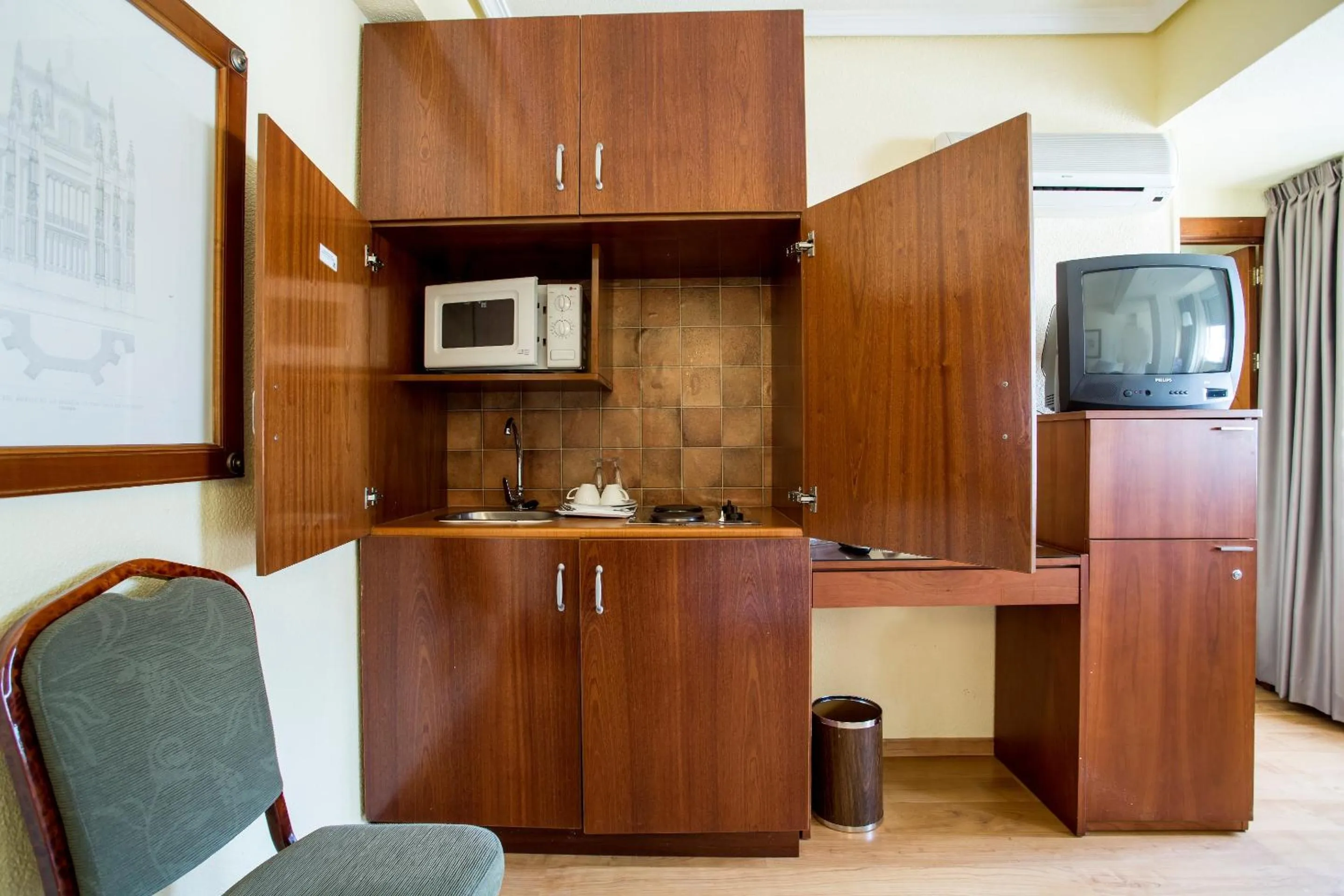 Kitchen or kitchenette in Torreluz Apartamentos