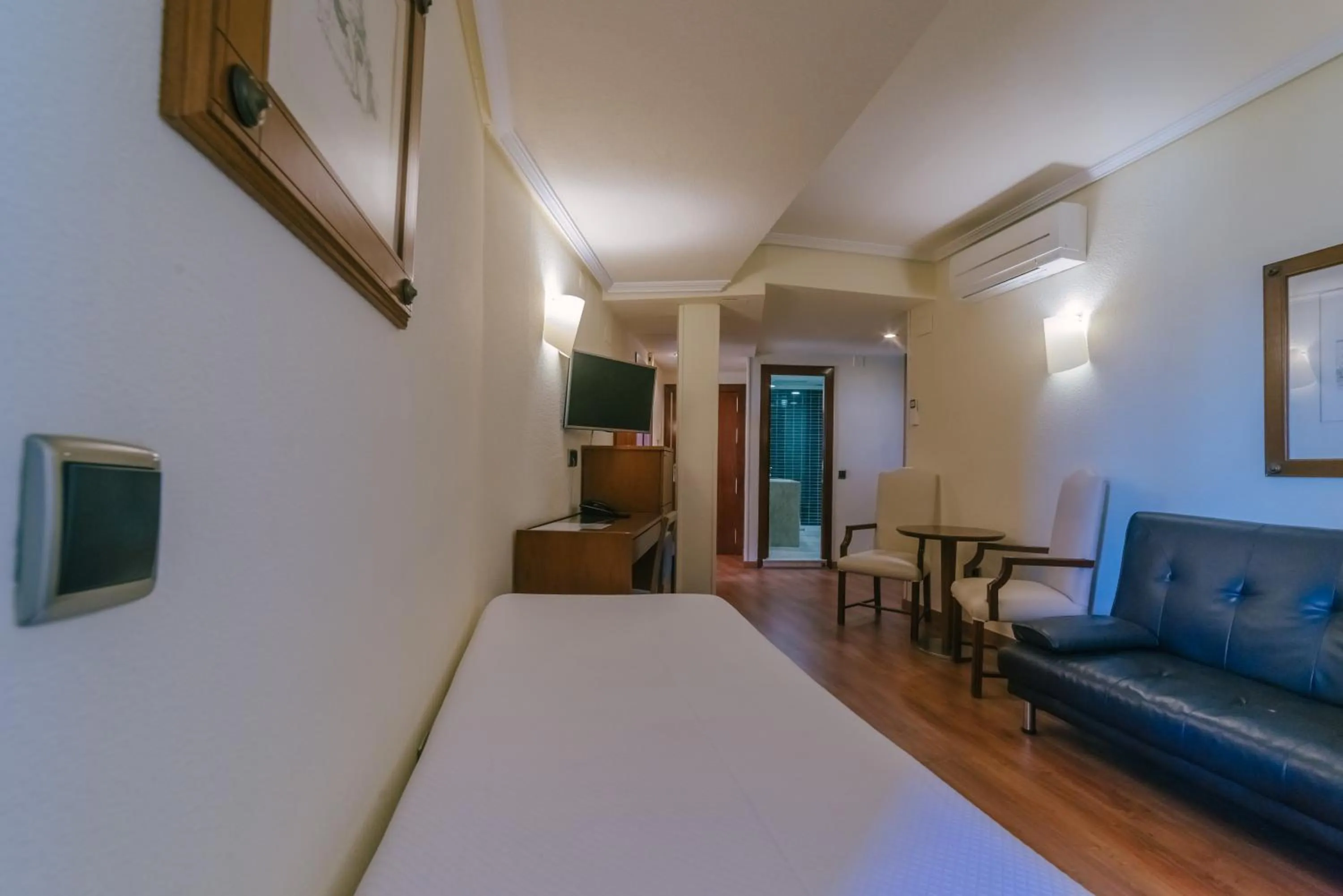 Living room, Bed in Torreluz Apartamentos