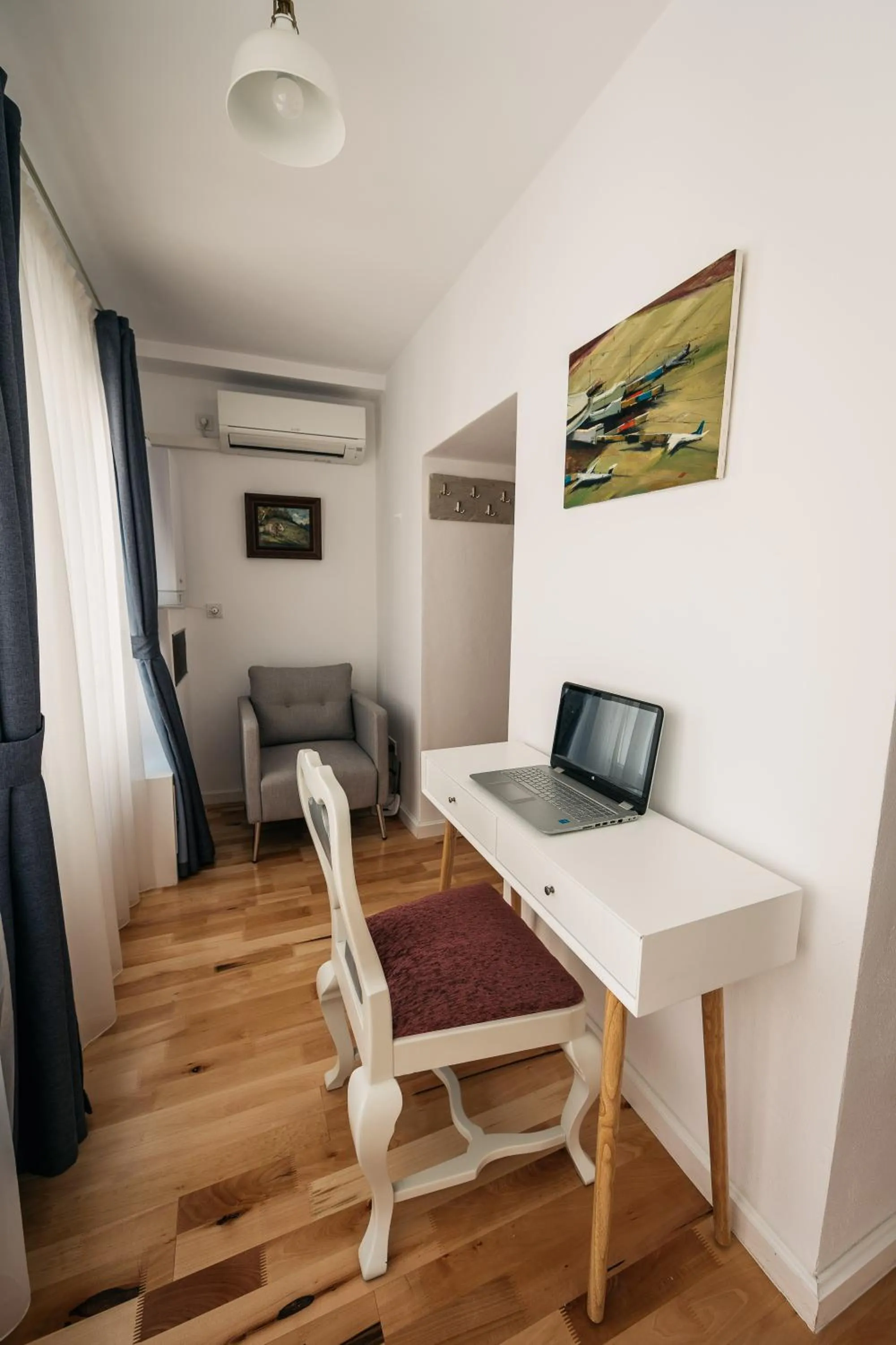 Library in YellowBoot Aparthotel