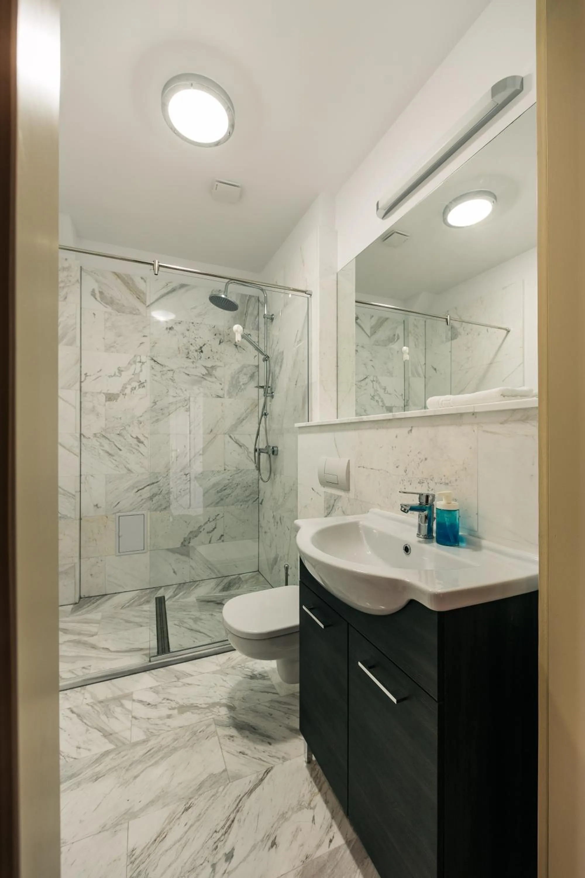 Shower in YellowBoot Aparthotel