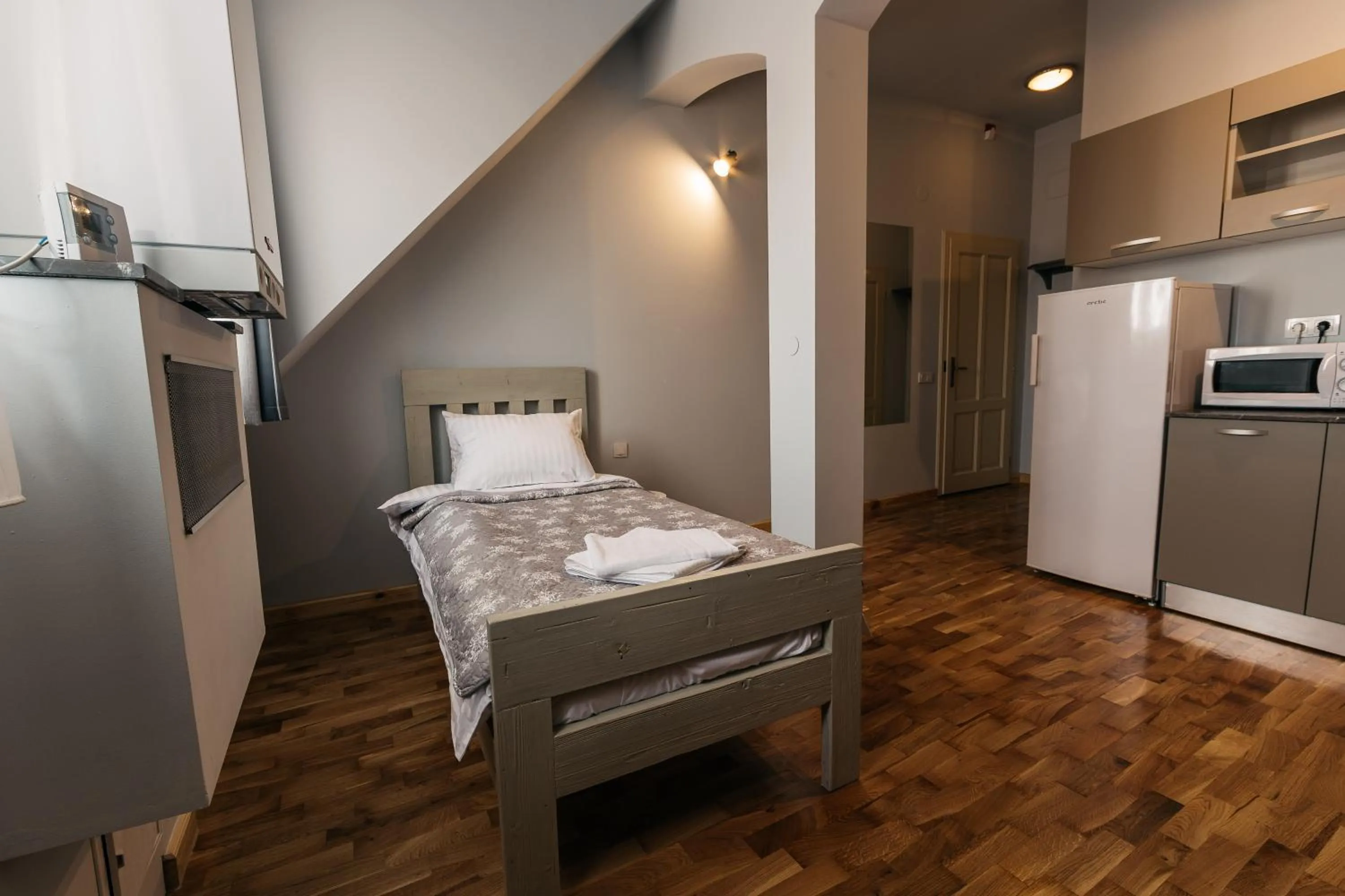 Bed in YellowBoot Aparthotel