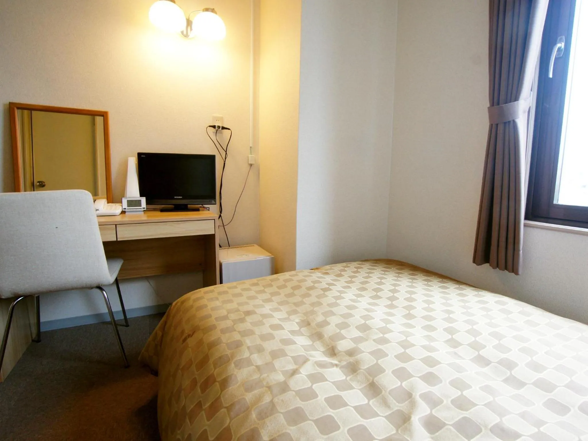 Photo of the whole room, Bed in Hotel Trend Iwakuni