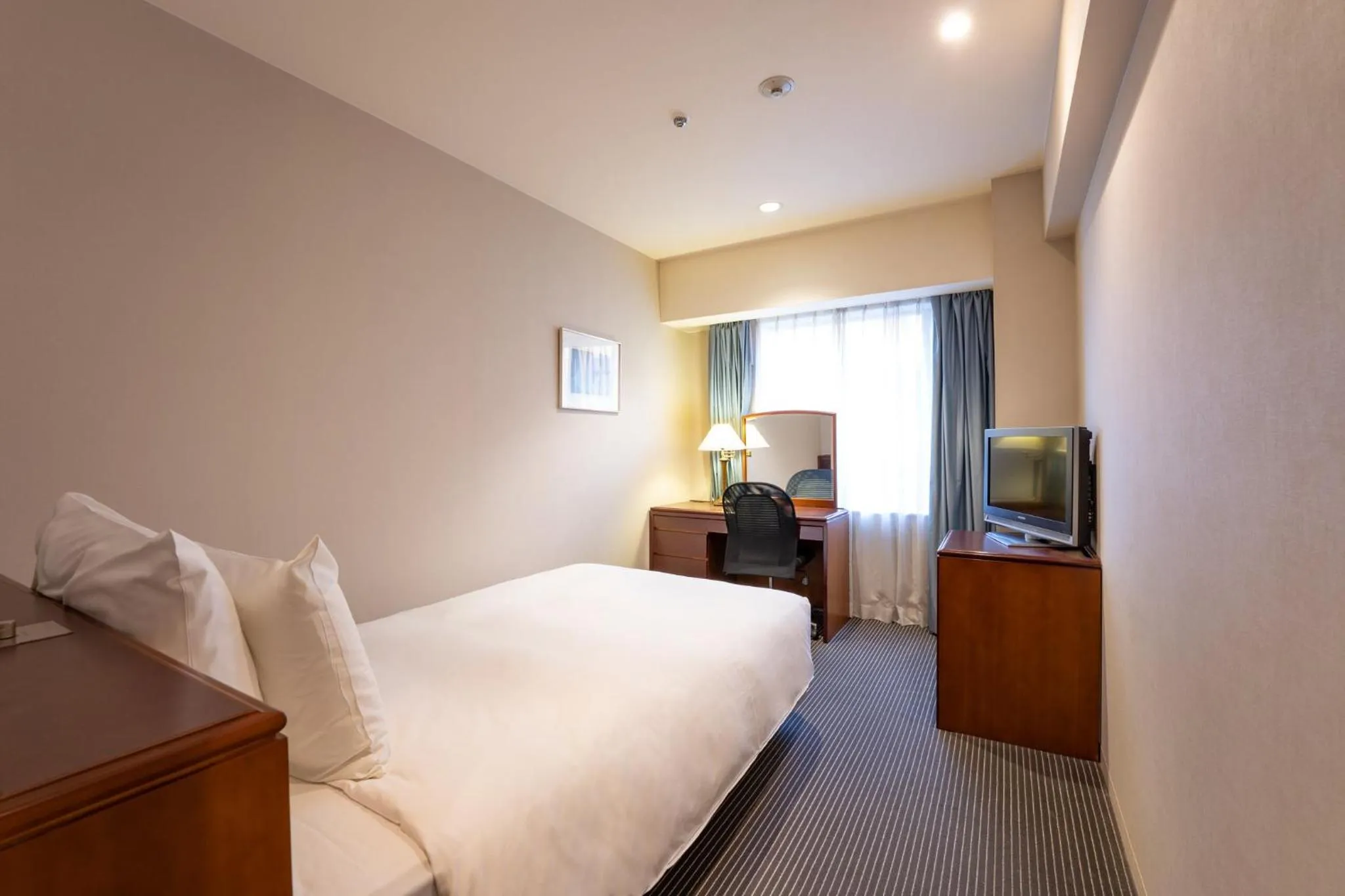 Photo of the whole room, Bed in ANA Crowne Plaza Hiroshima by IHG