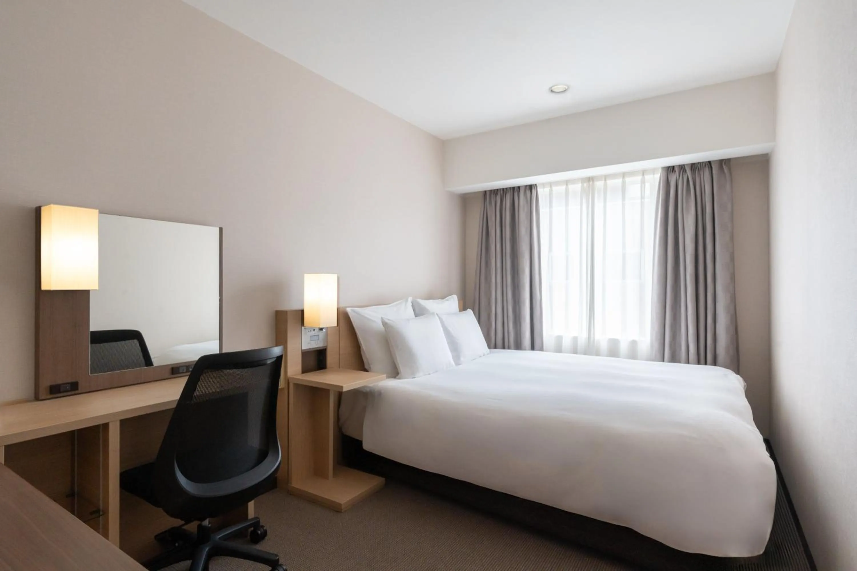 Photo of the whole room, Bed in ANA Crowne Plaza Hiroshima by IHG