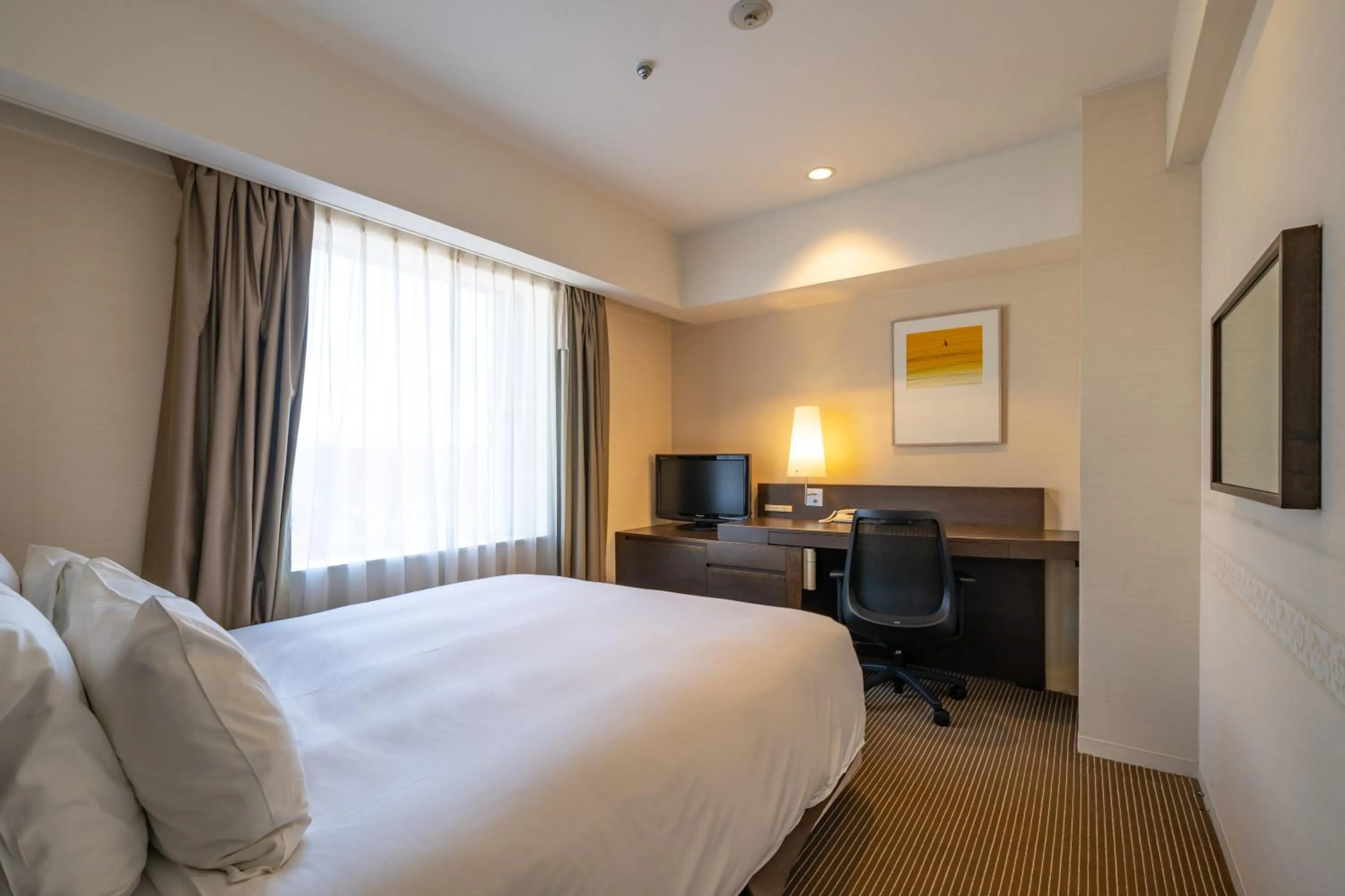 Photo of the whole room, Bed in ANA Crowne Plaza Hiroshima by IHG