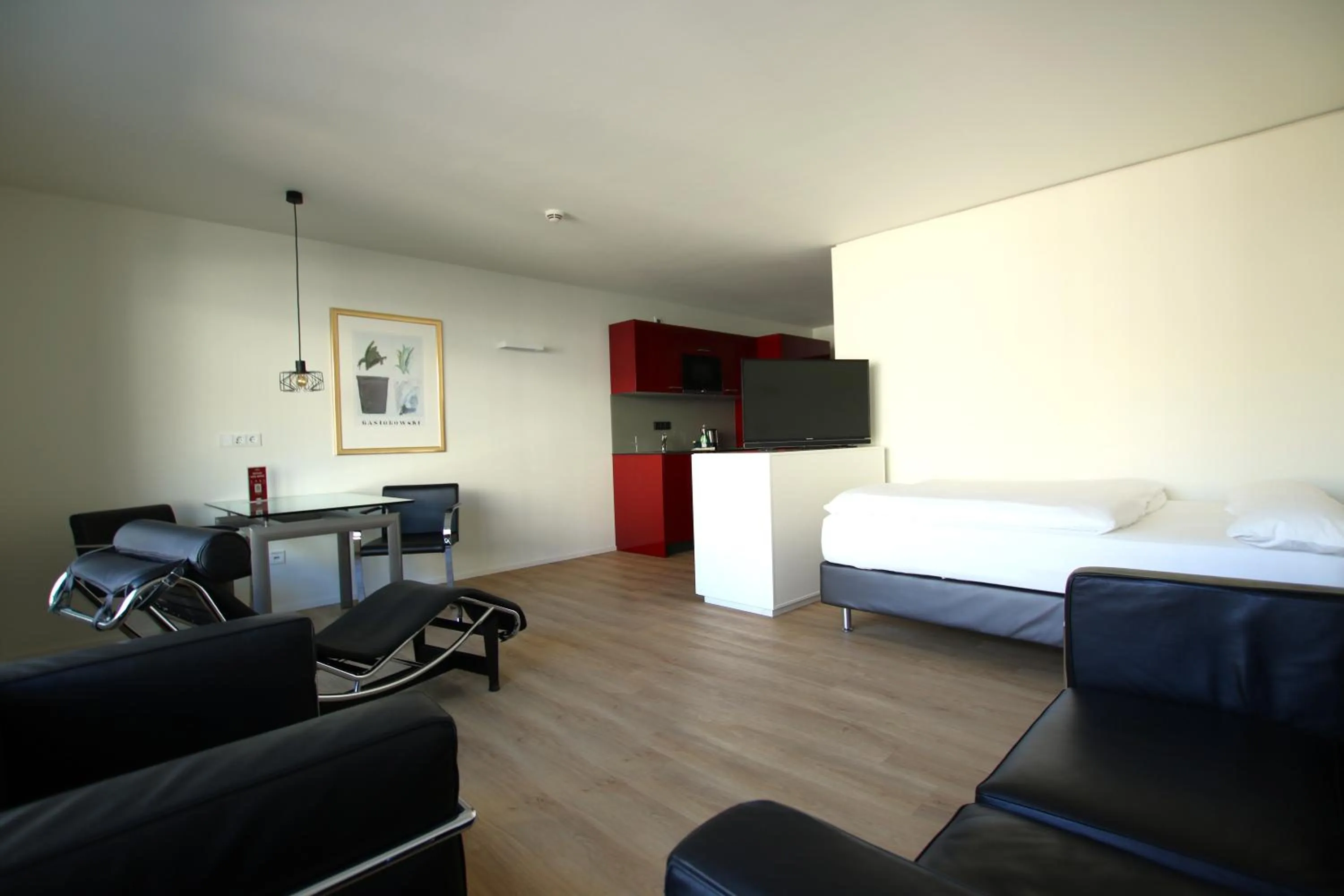 Photo of the whole room, Bed in MAVO Hospitality Esslingen Berliner Straße