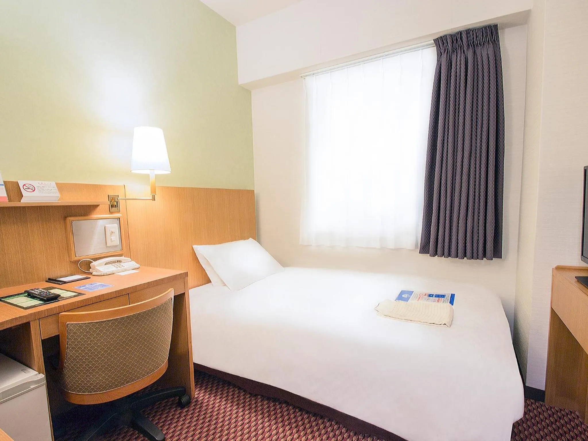 Photo of the whole room, Bed in Hearton Hotel Shinsaibashi