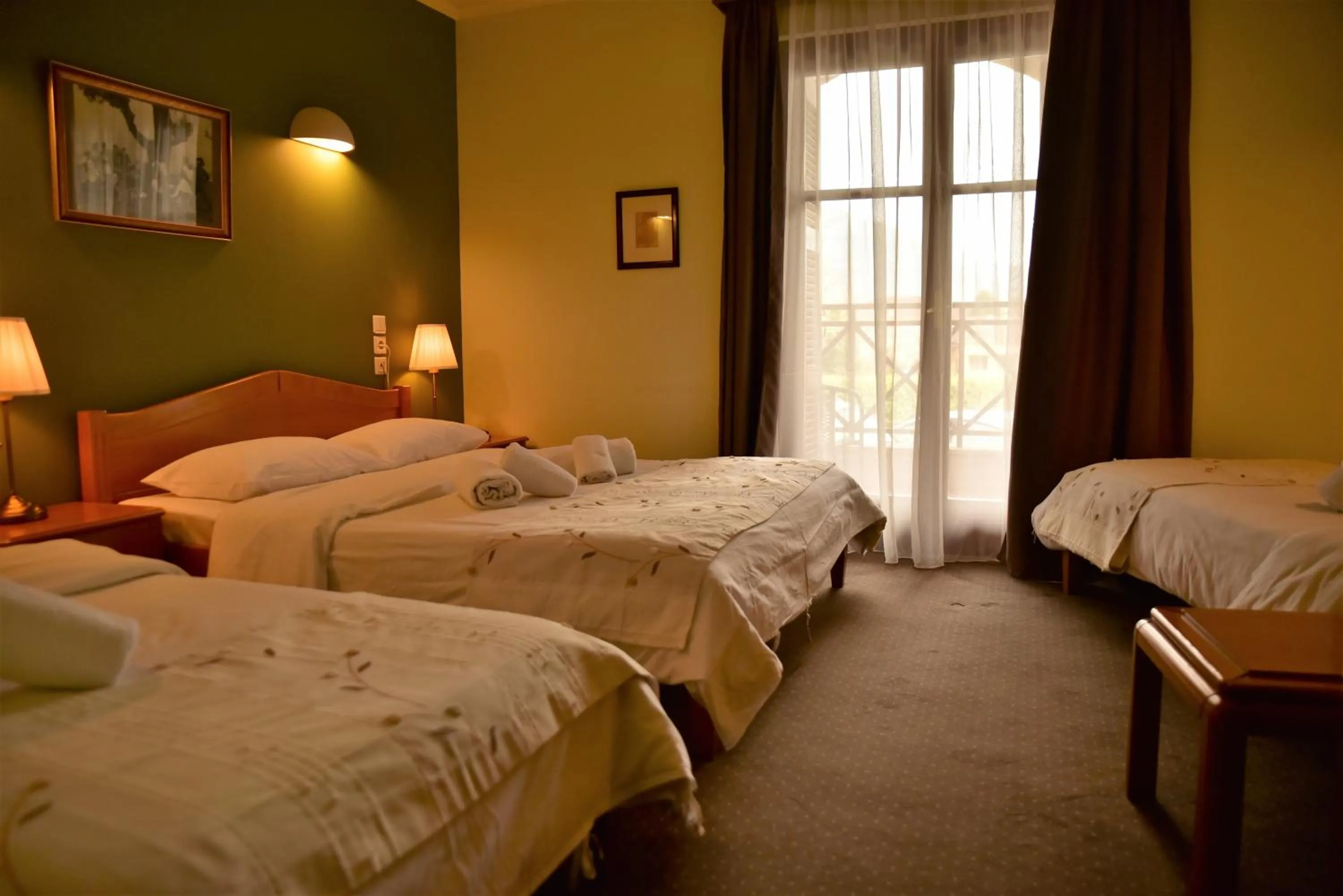 Bed in Mont Helmos Hotel