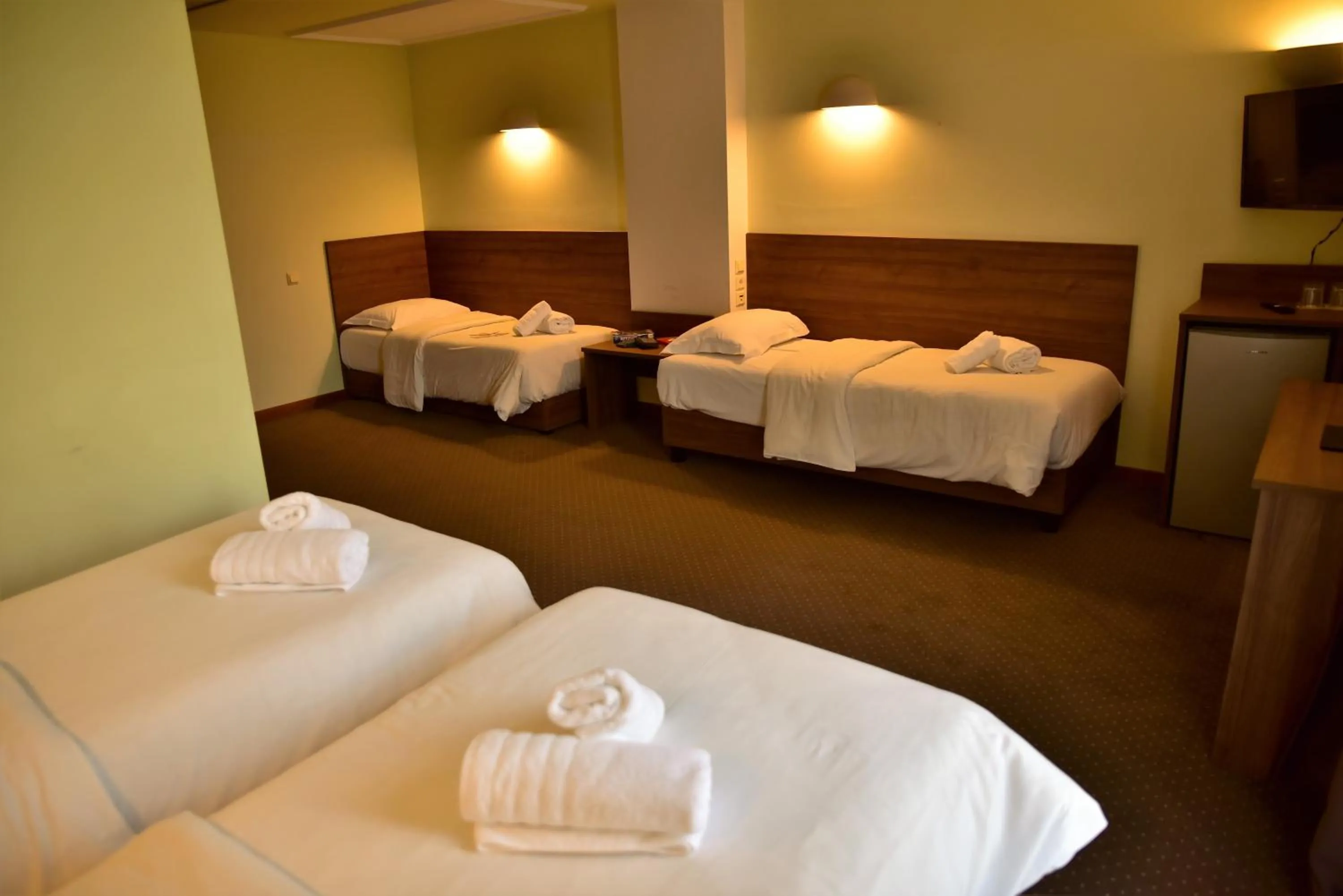 Bed in Mont Helmos Hotel