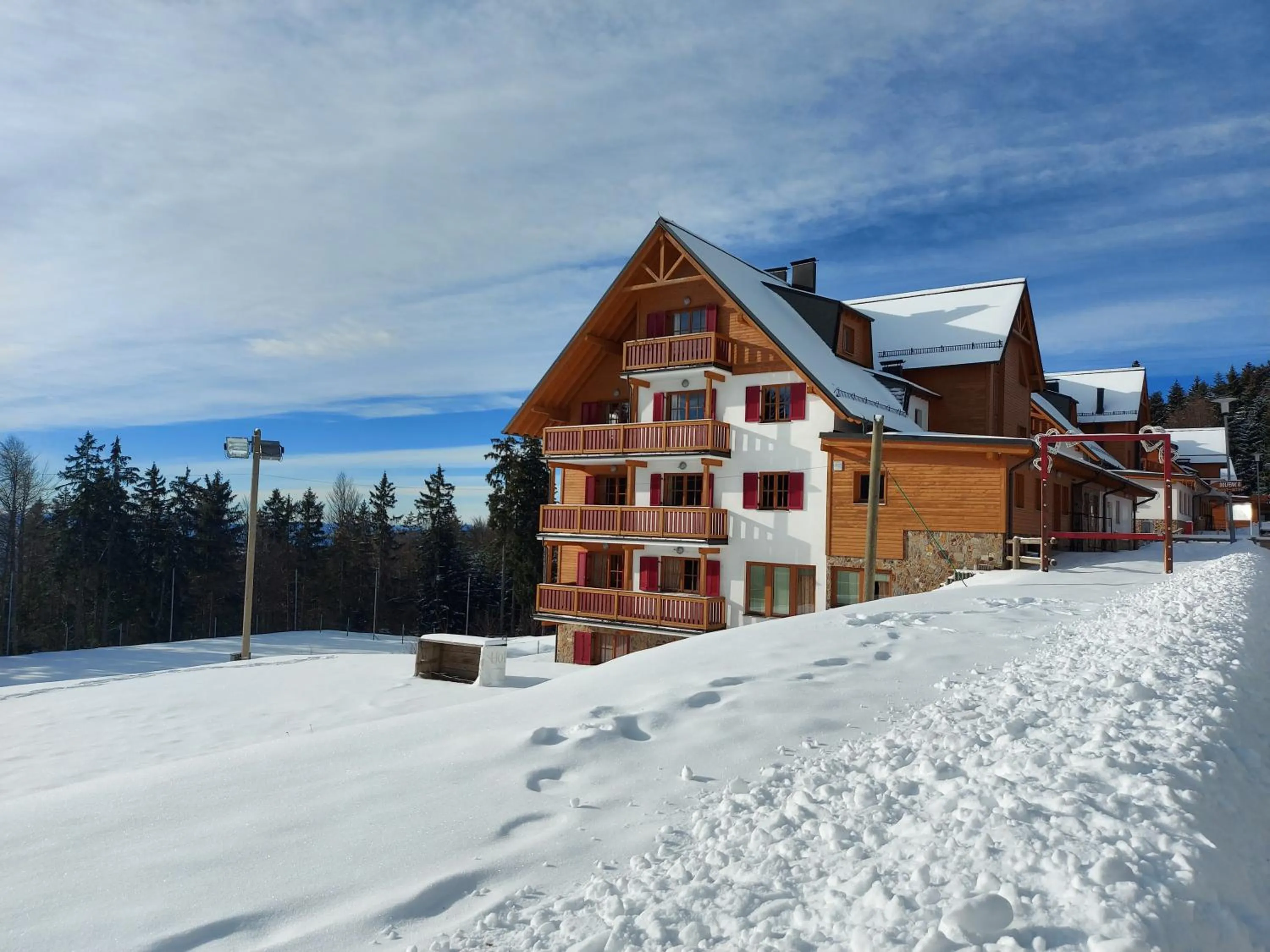 Property building in Pohorje Village Wellbeing Resort - Forest Hotel Videc