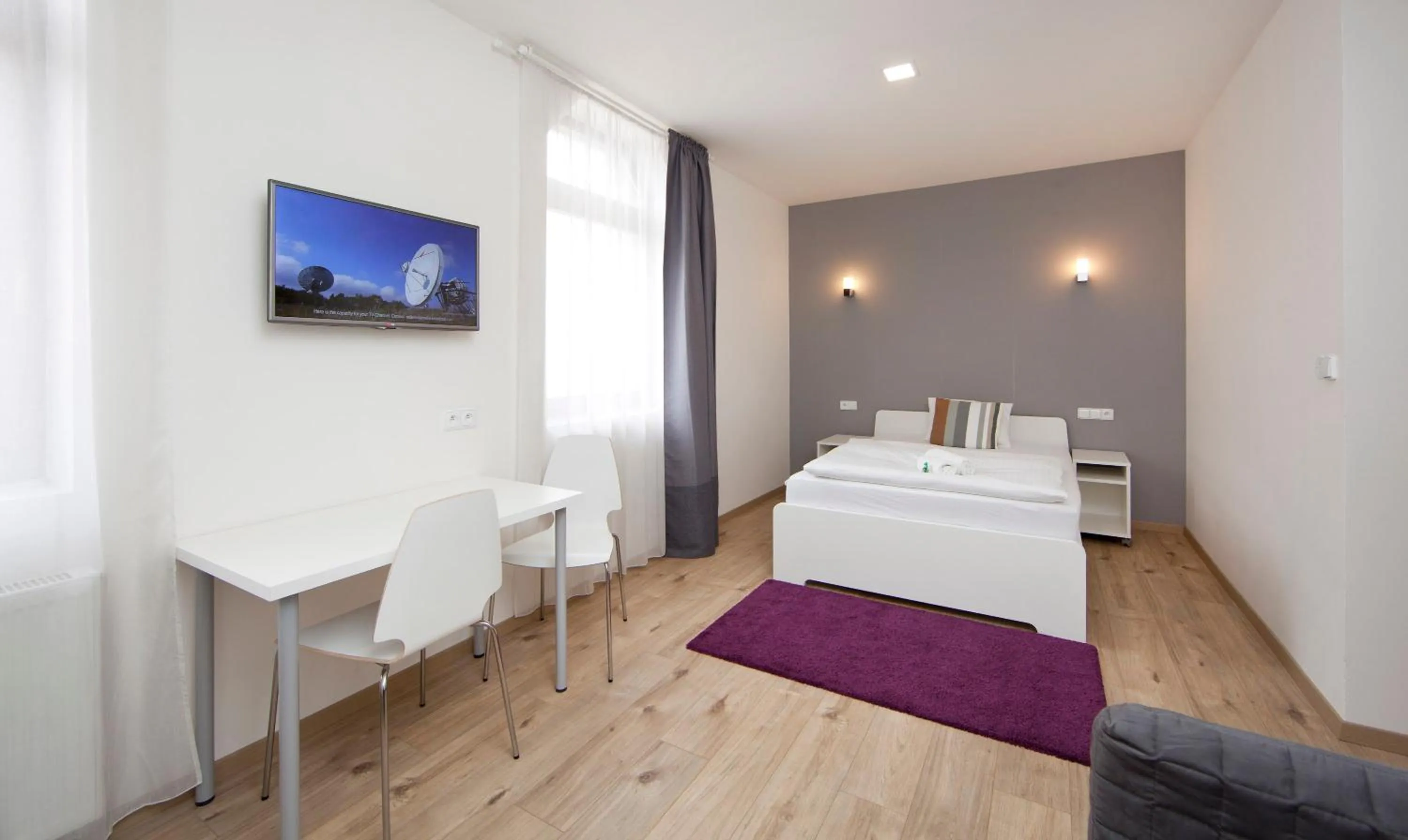 Bed in Rozmaryn Rooms & Apartments