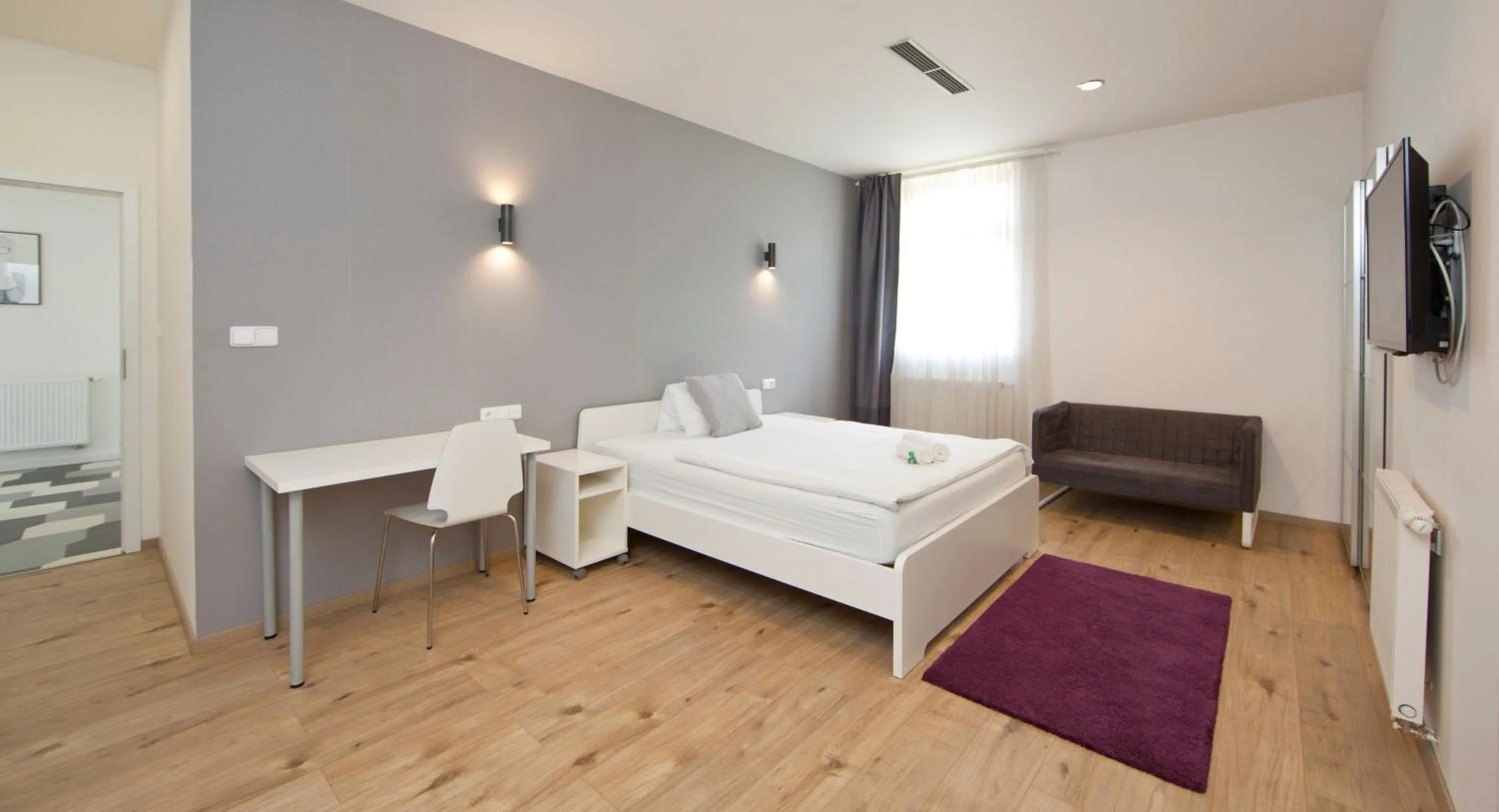 Bed in Rozmaryn Rooms & Apartments