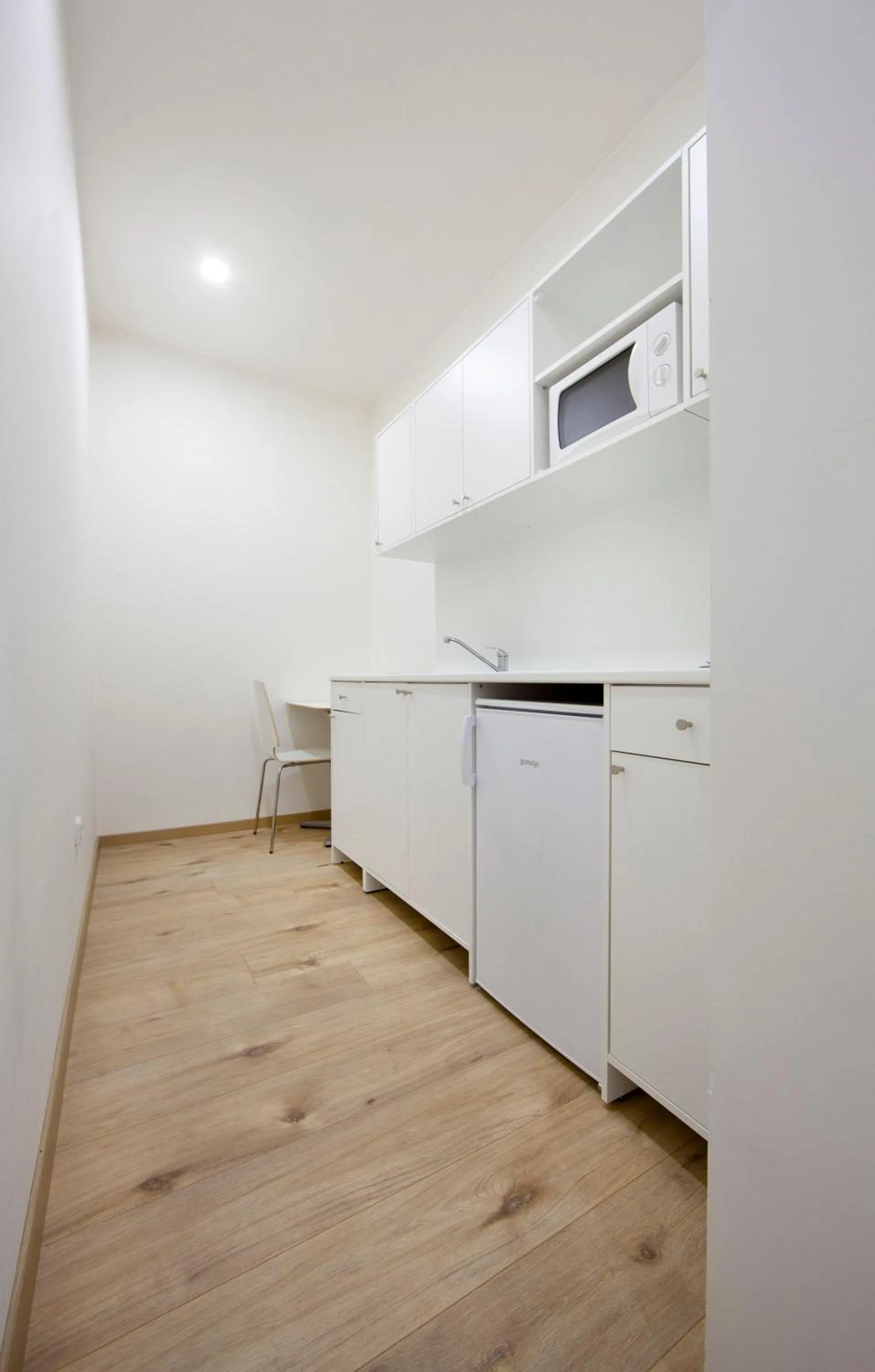 Kitchen or kitchenette in Rozmaryn Rooms & Apartments