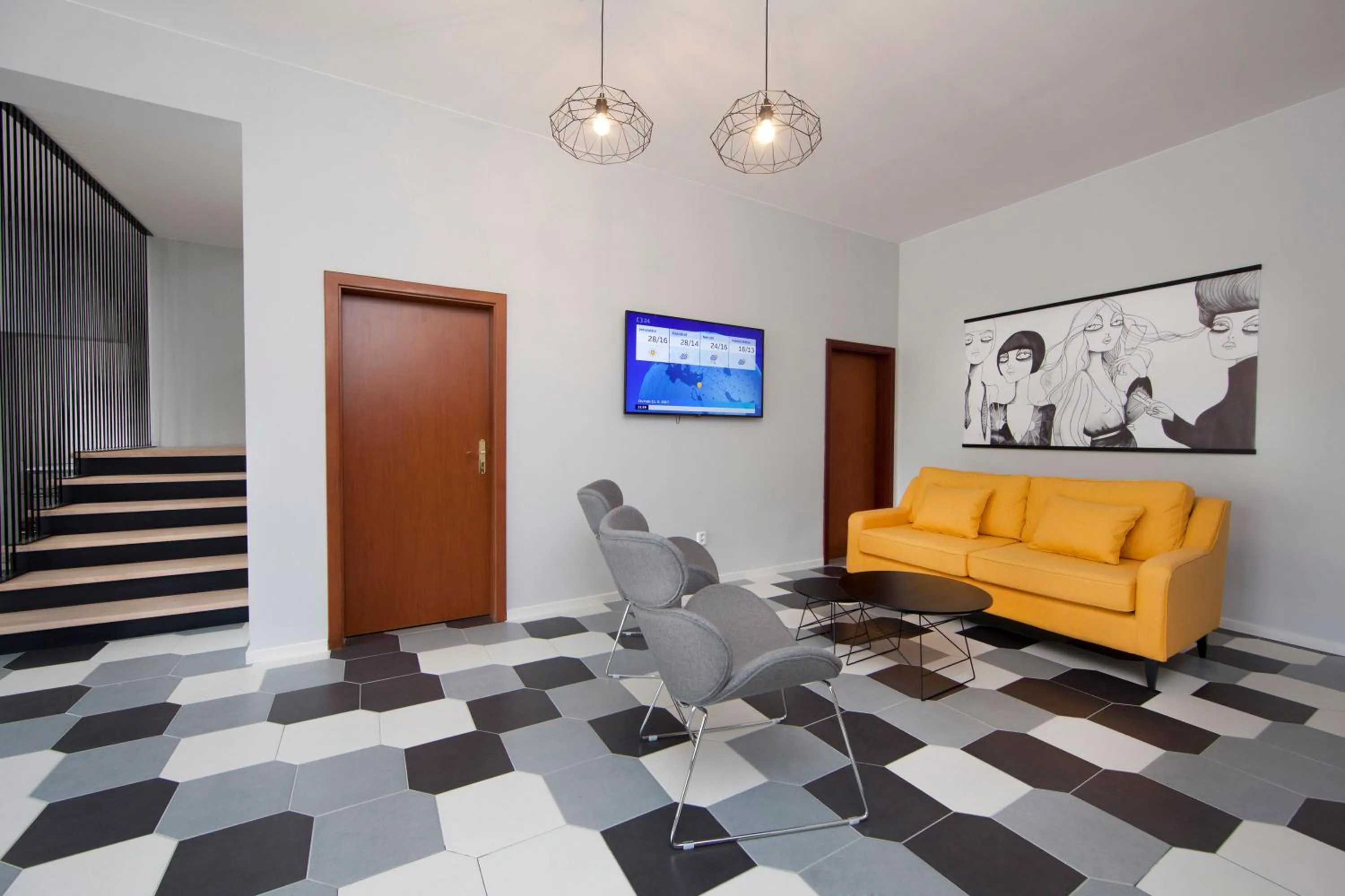 Communal lounge/ TV room in Rozmaryn Rooms & Apartments