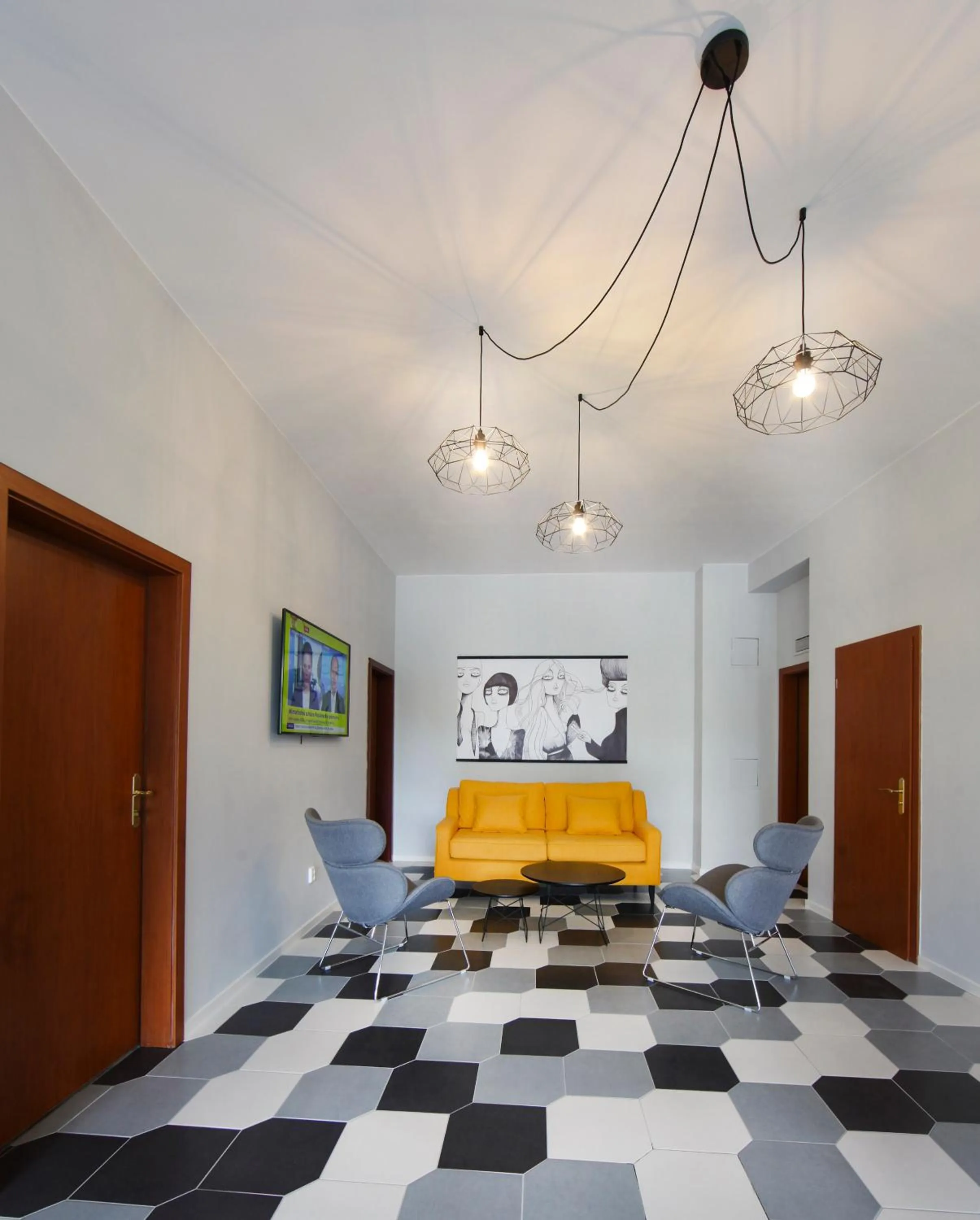 Communal lounge/ TV room in Rozmaryn Rooms & Apartments