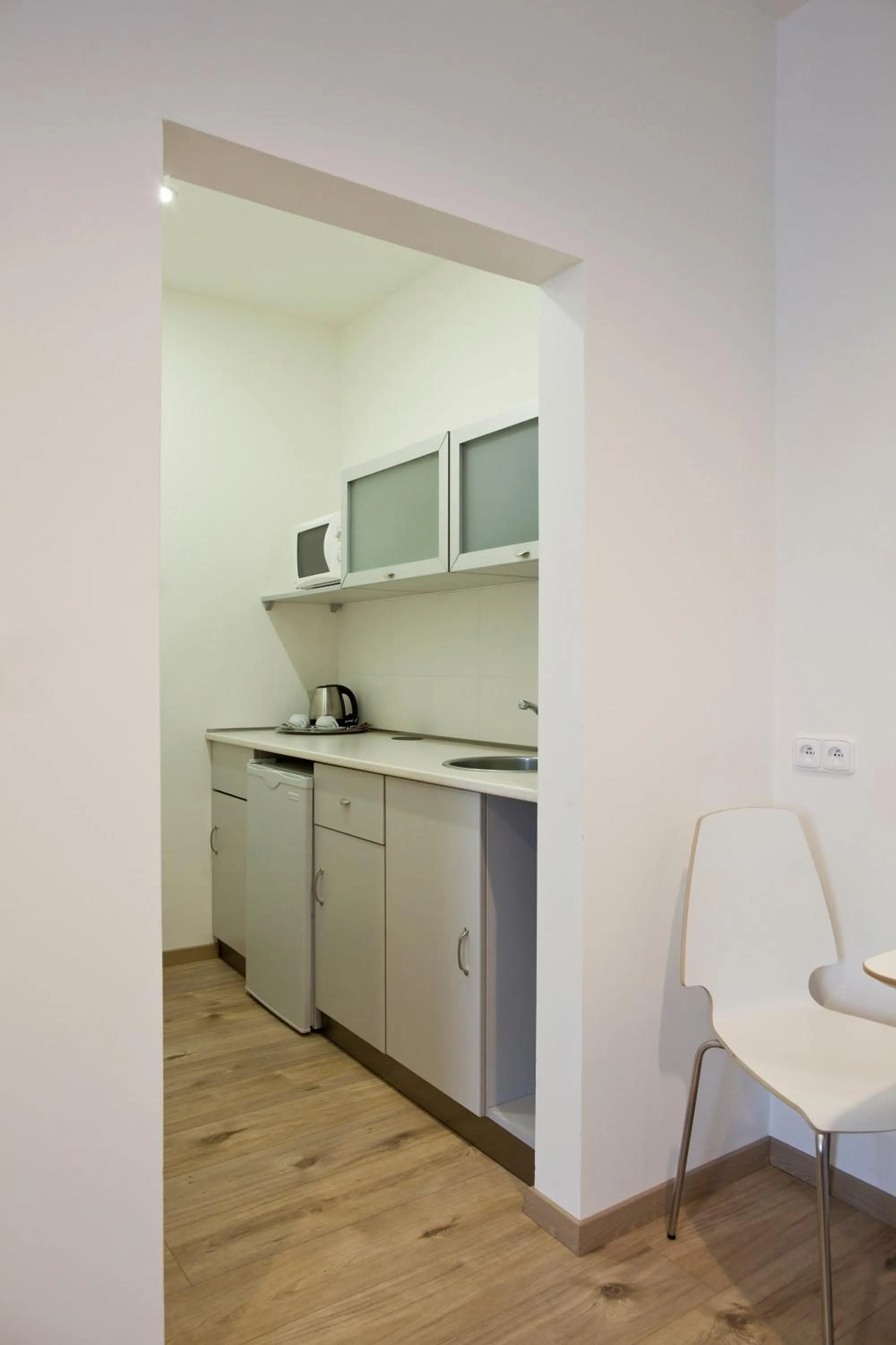 Kitchen or kitchenette in Rozmaryn Rooms & Apartments