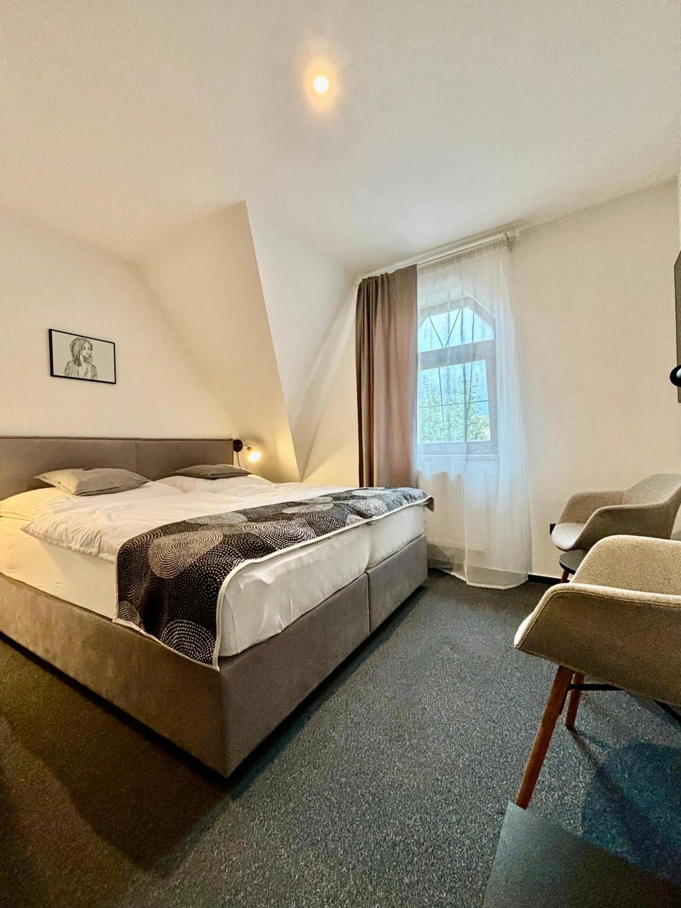 Bed in Rozmaryn Rooms & Apartments