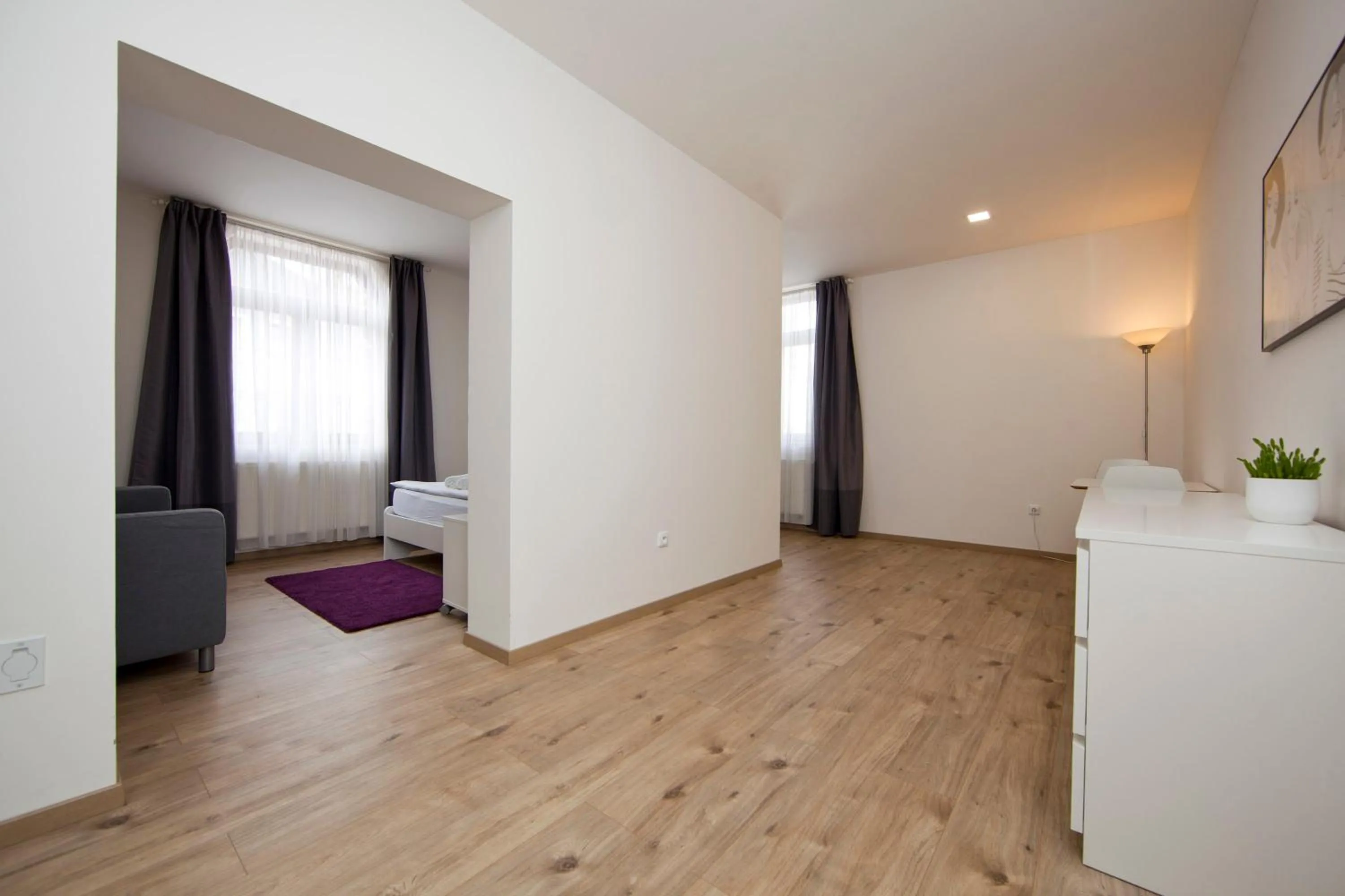 Living room, Bed in Rozmaryn Rooms & Apartments