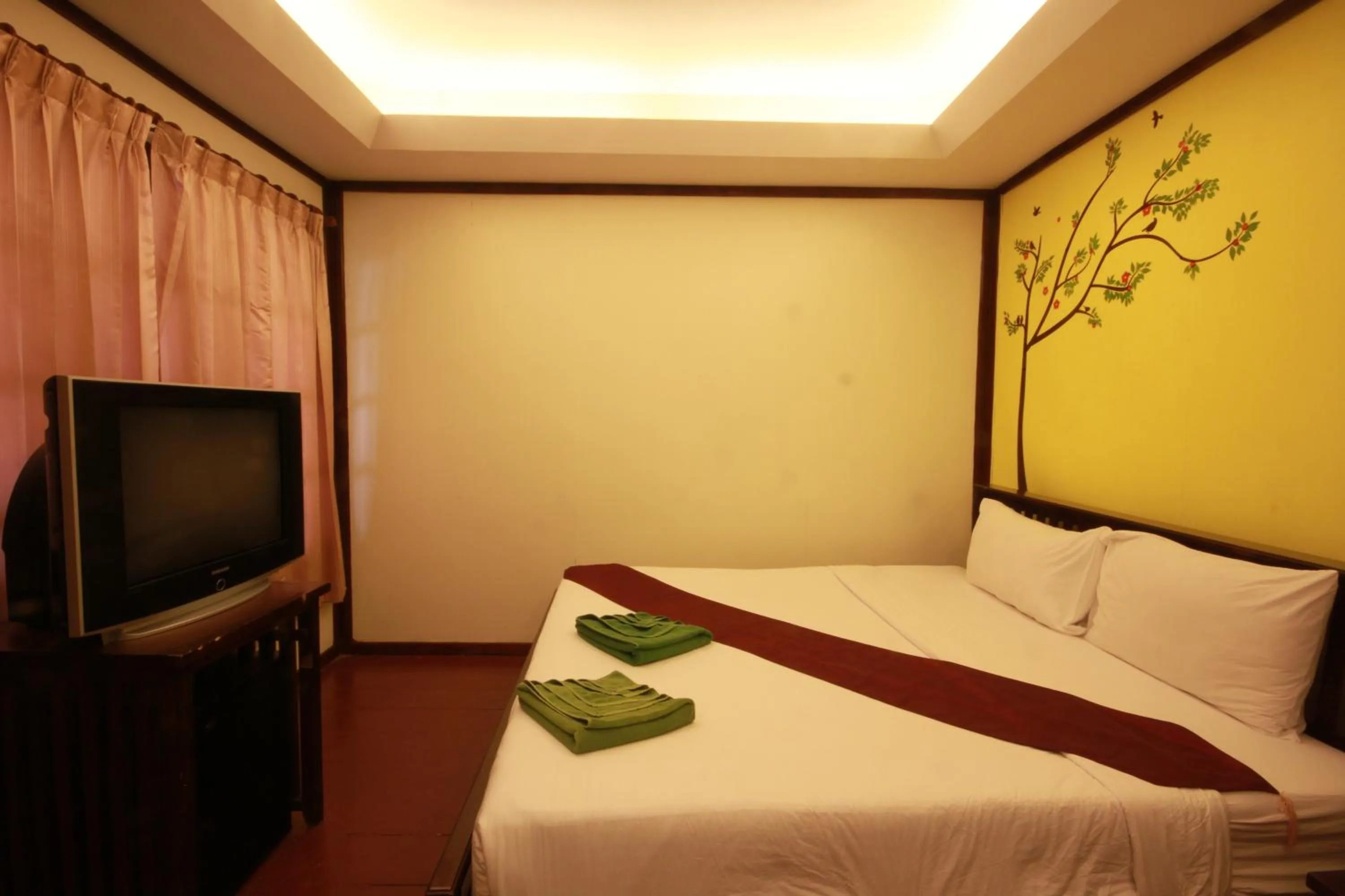 Bedroom in Tharathip Resort Koh Phangan - SHA Plus