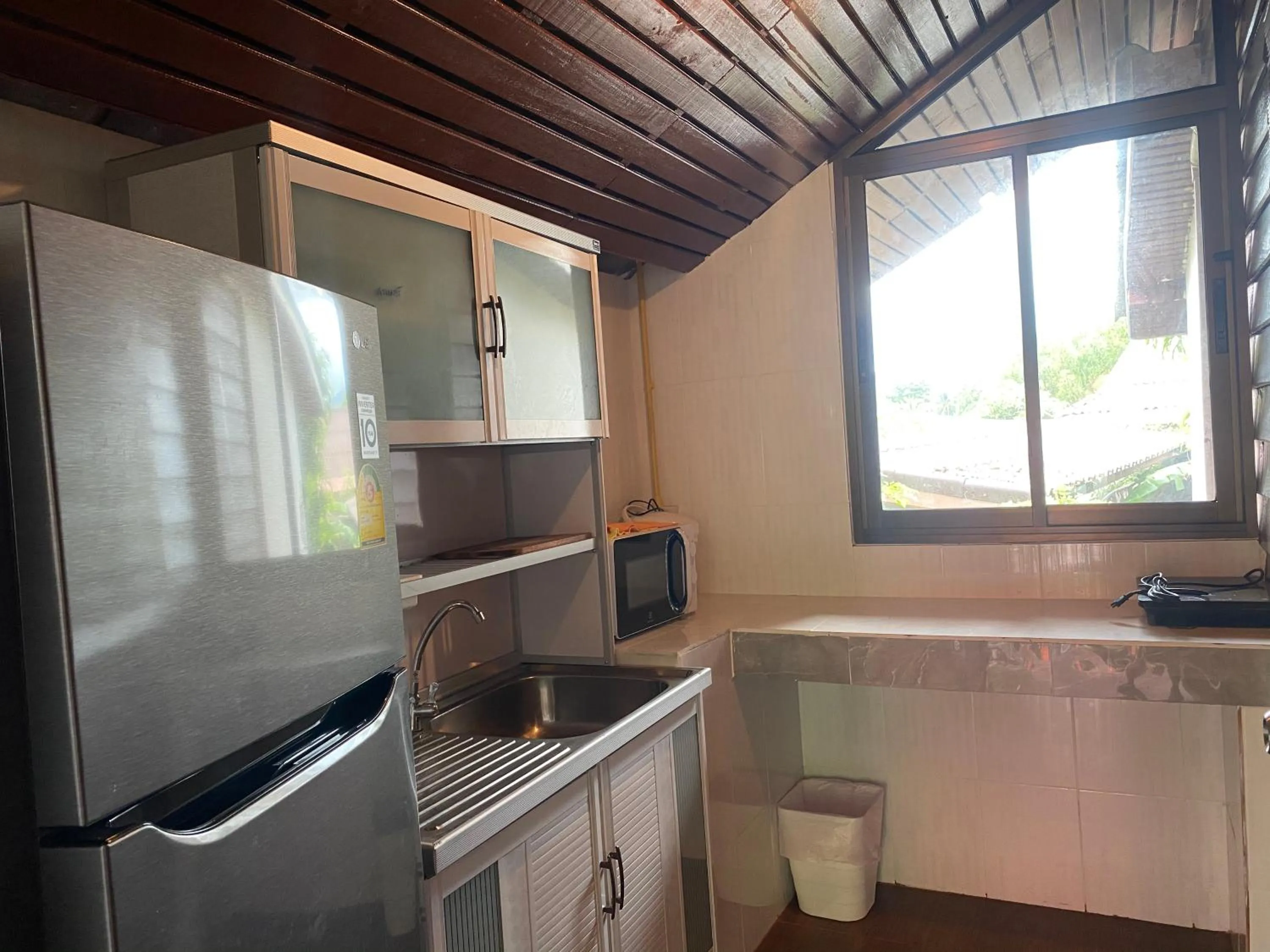 Kitchen or kitchenette in Tharathip Resort Koh Phangan - SHA Plus