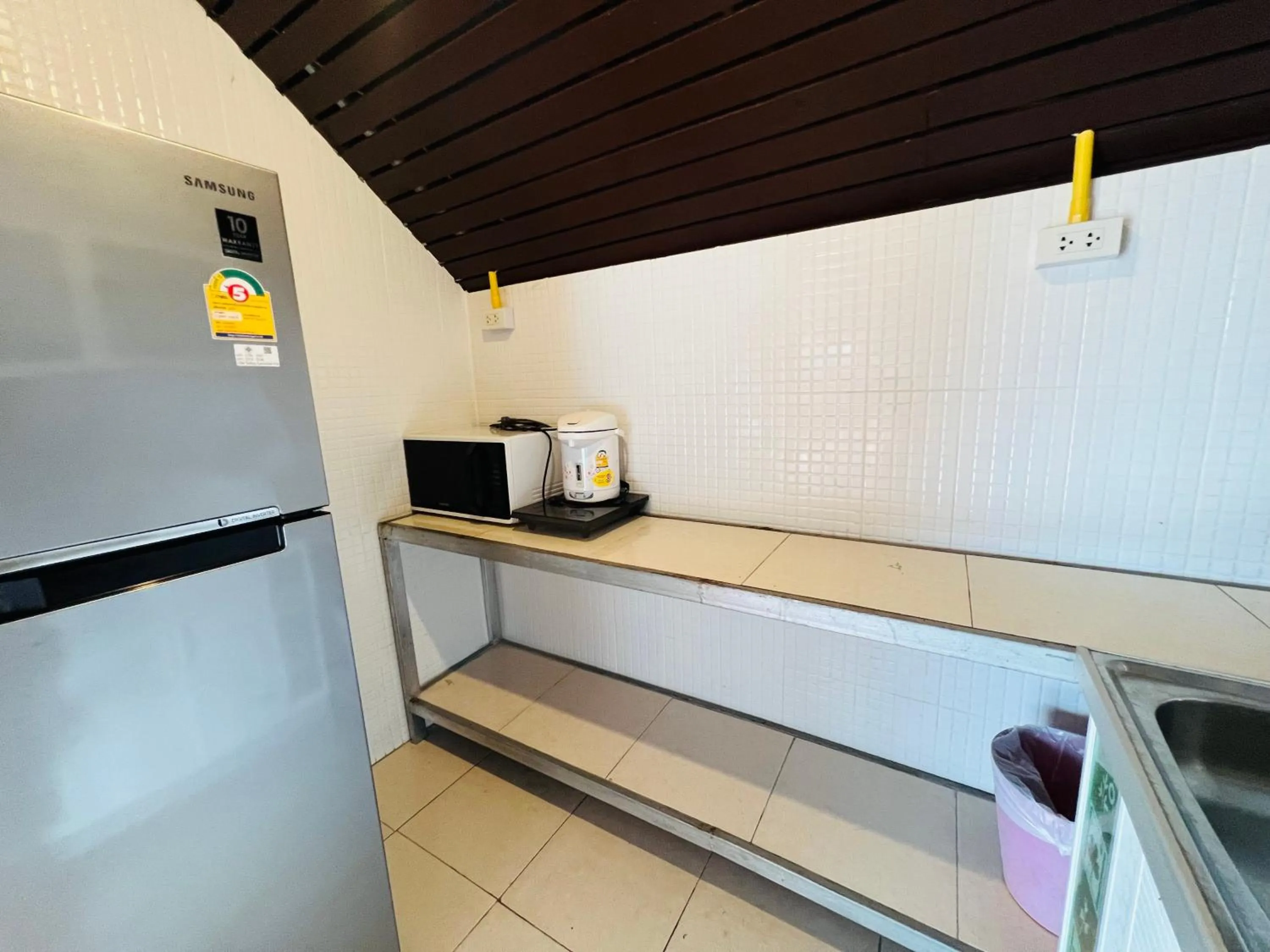 Kitchen or kitchenette in Tharathip Resort Koh Phangan - SHA Plus