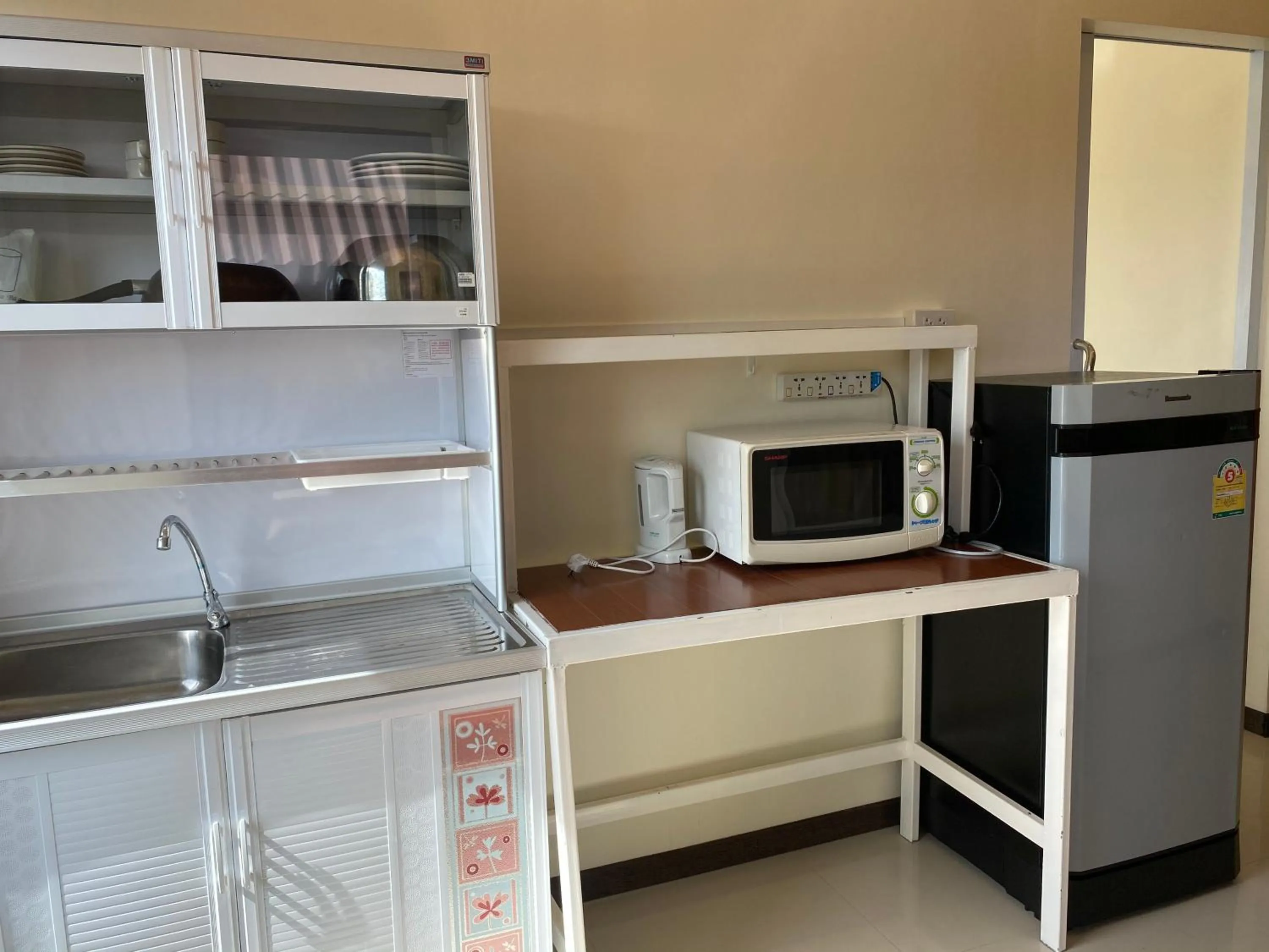 Kitchen or kitchenette in Tharathip Resort Koh Phangan - SHA Plus