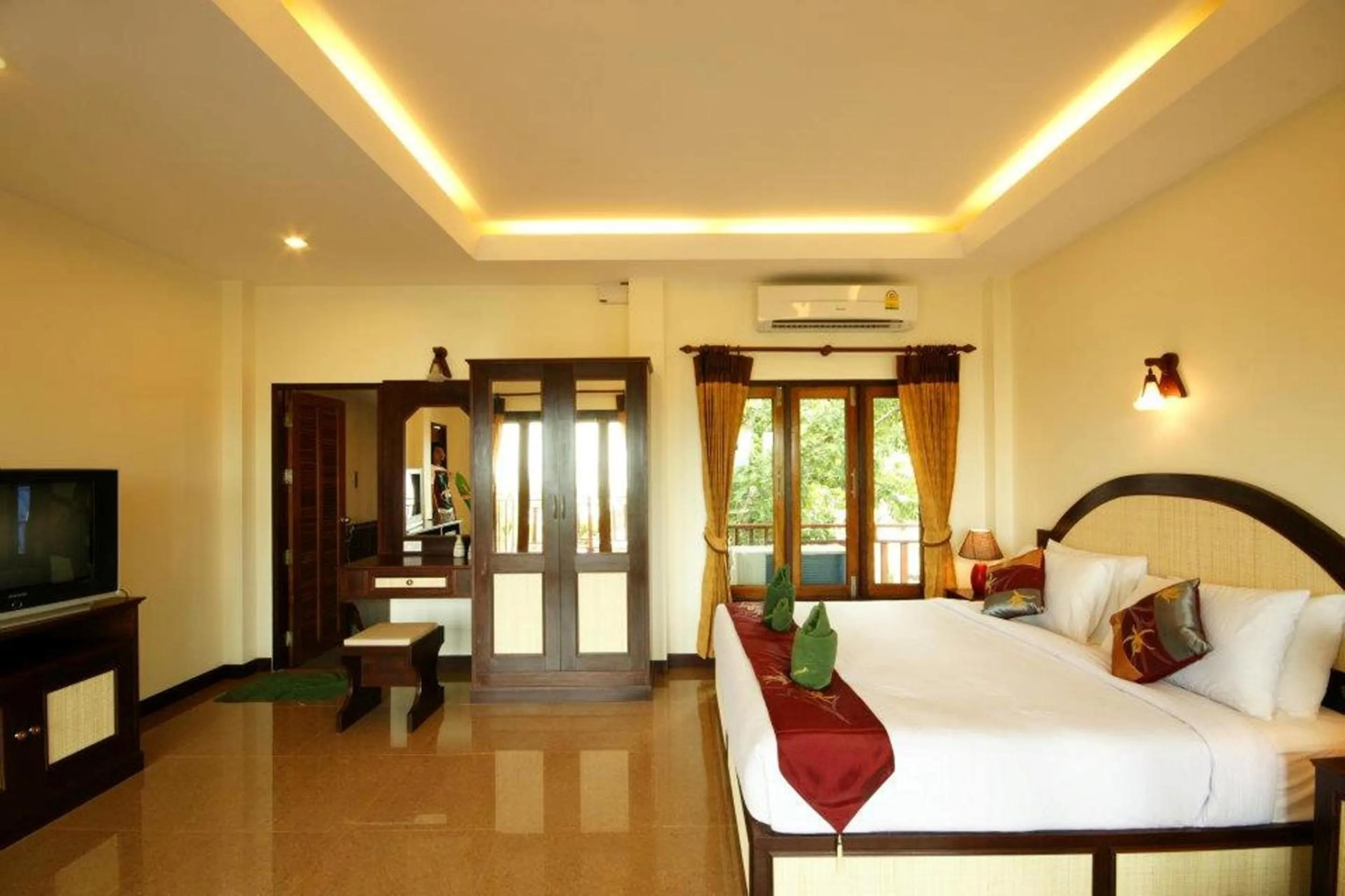 Bedroom in Tharathip Resort Koh Phangan - SHA Plus