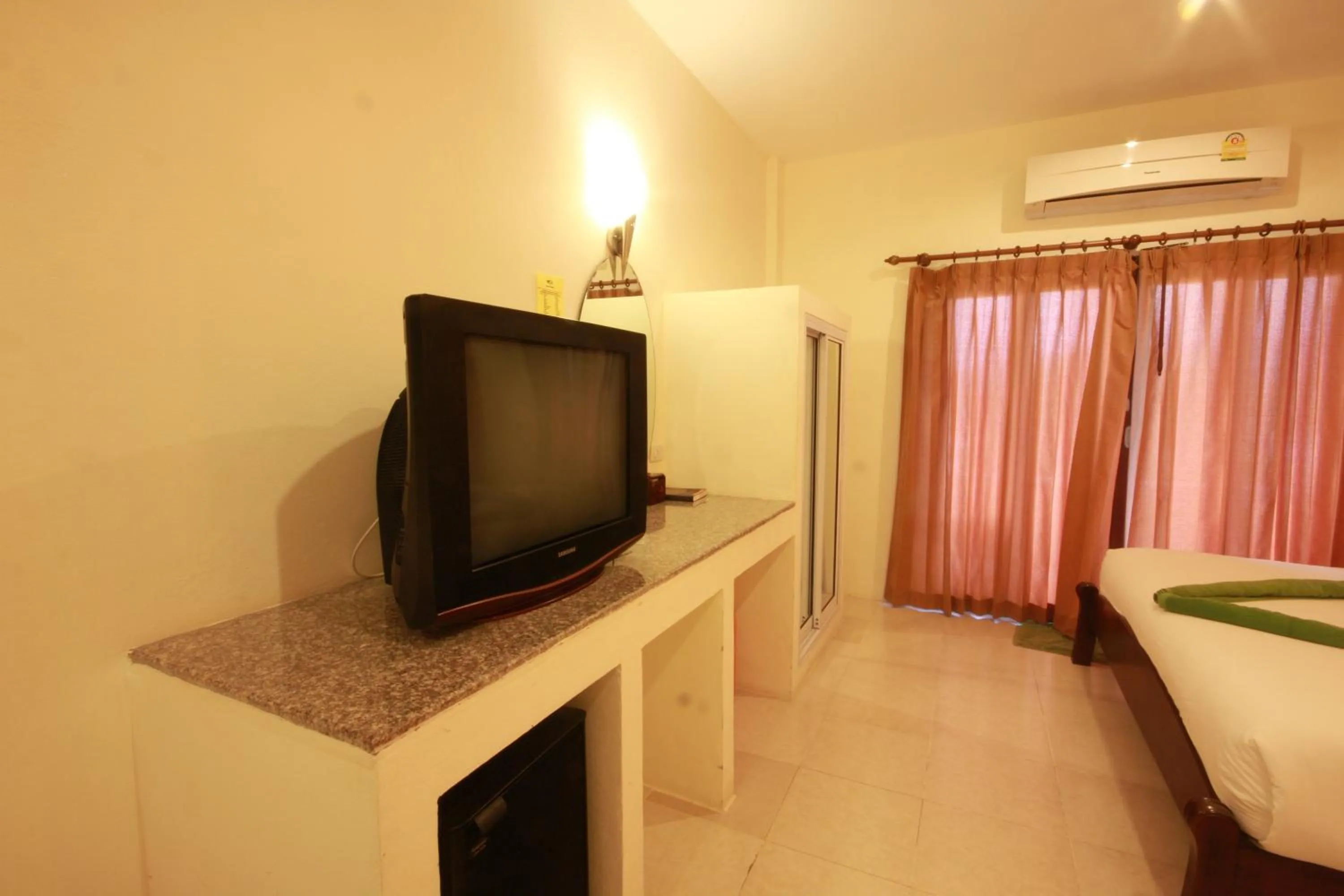 TV and multimedia in Tharathip Resort Koh Phangan - SHA Plus