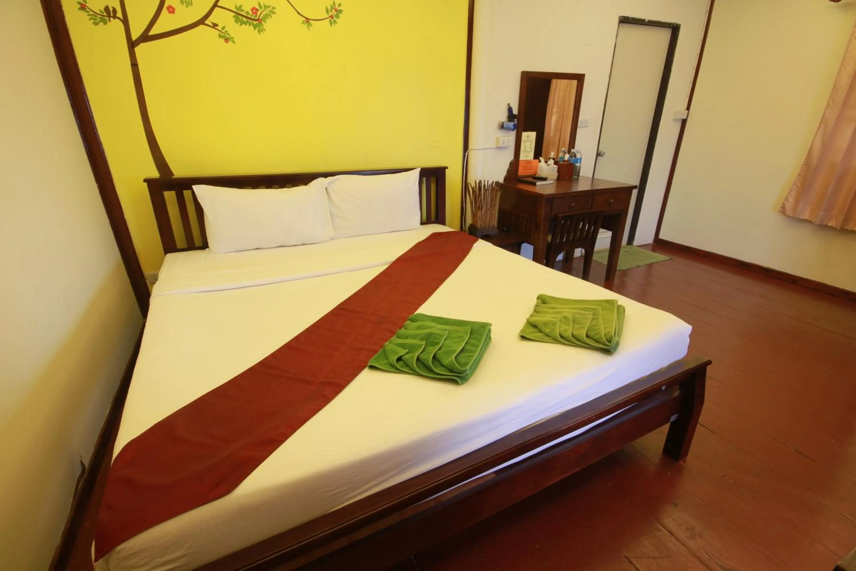 Bed in Tharathip Resort Koh Phangan - SHA Plus