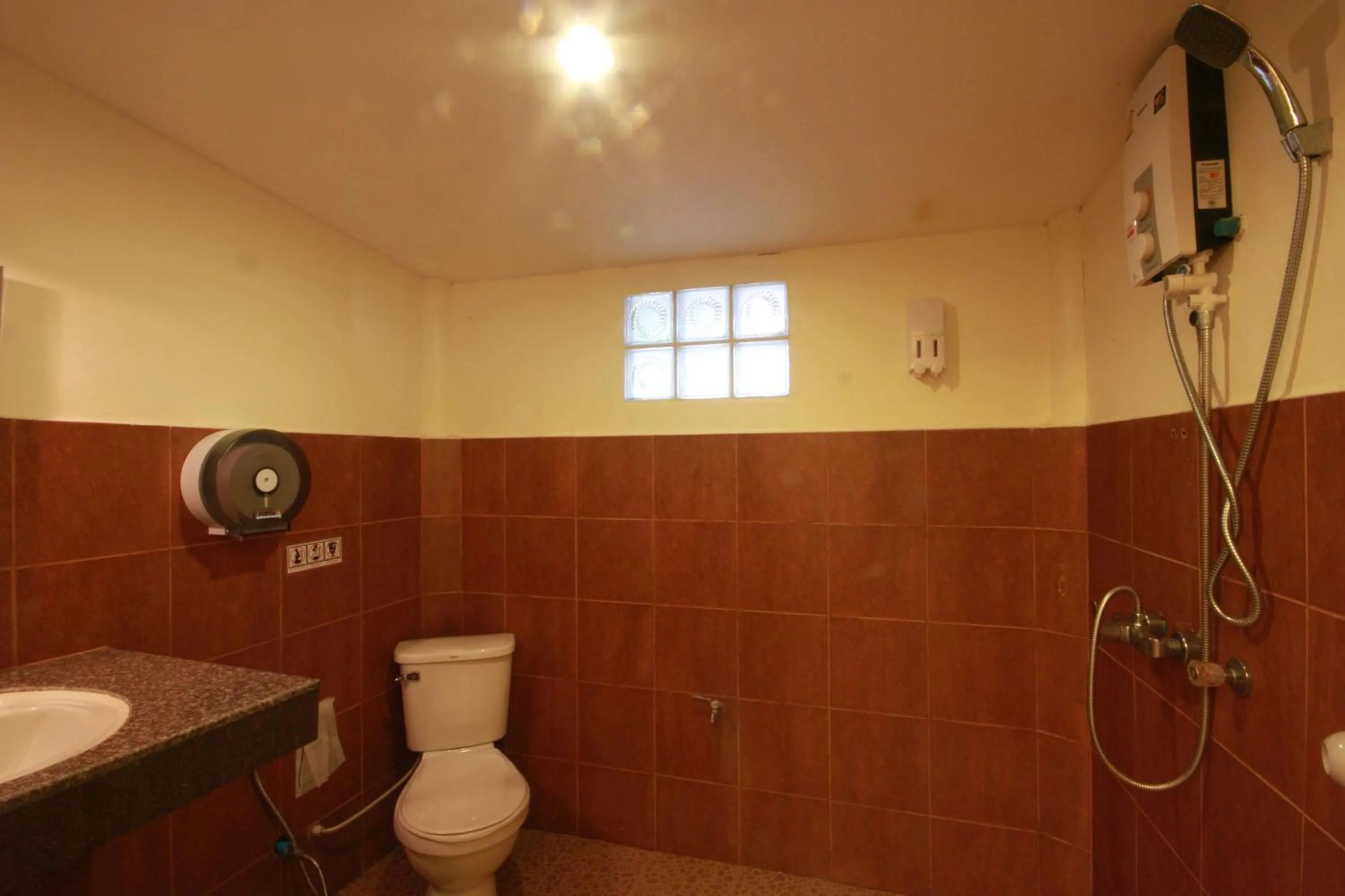 Toilet in Tharathip Resort Koh Phangan - SHA Plus