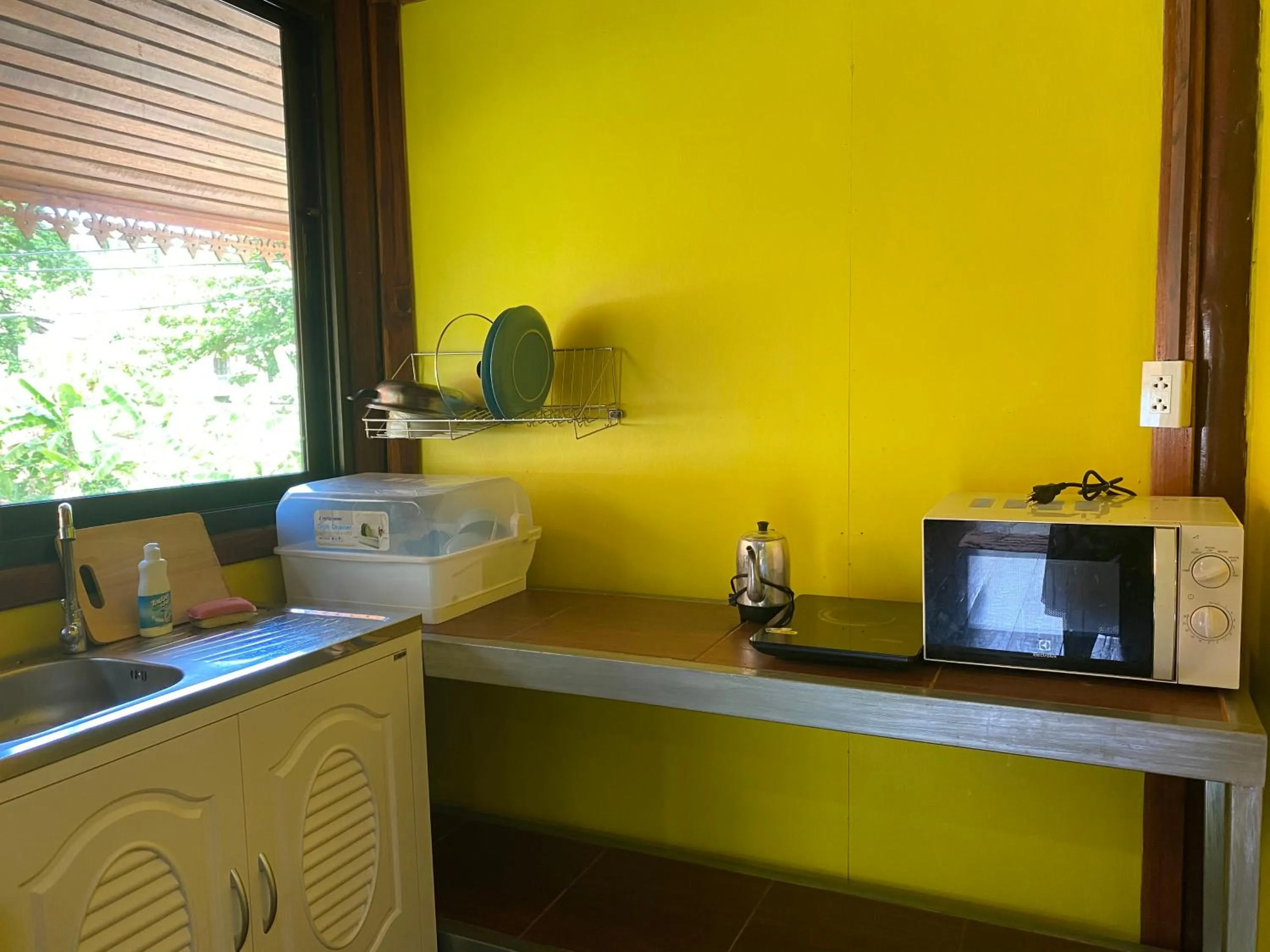 Kitchen or kitchenette in Tharathip Resort Koh Phangan - SHA Plus