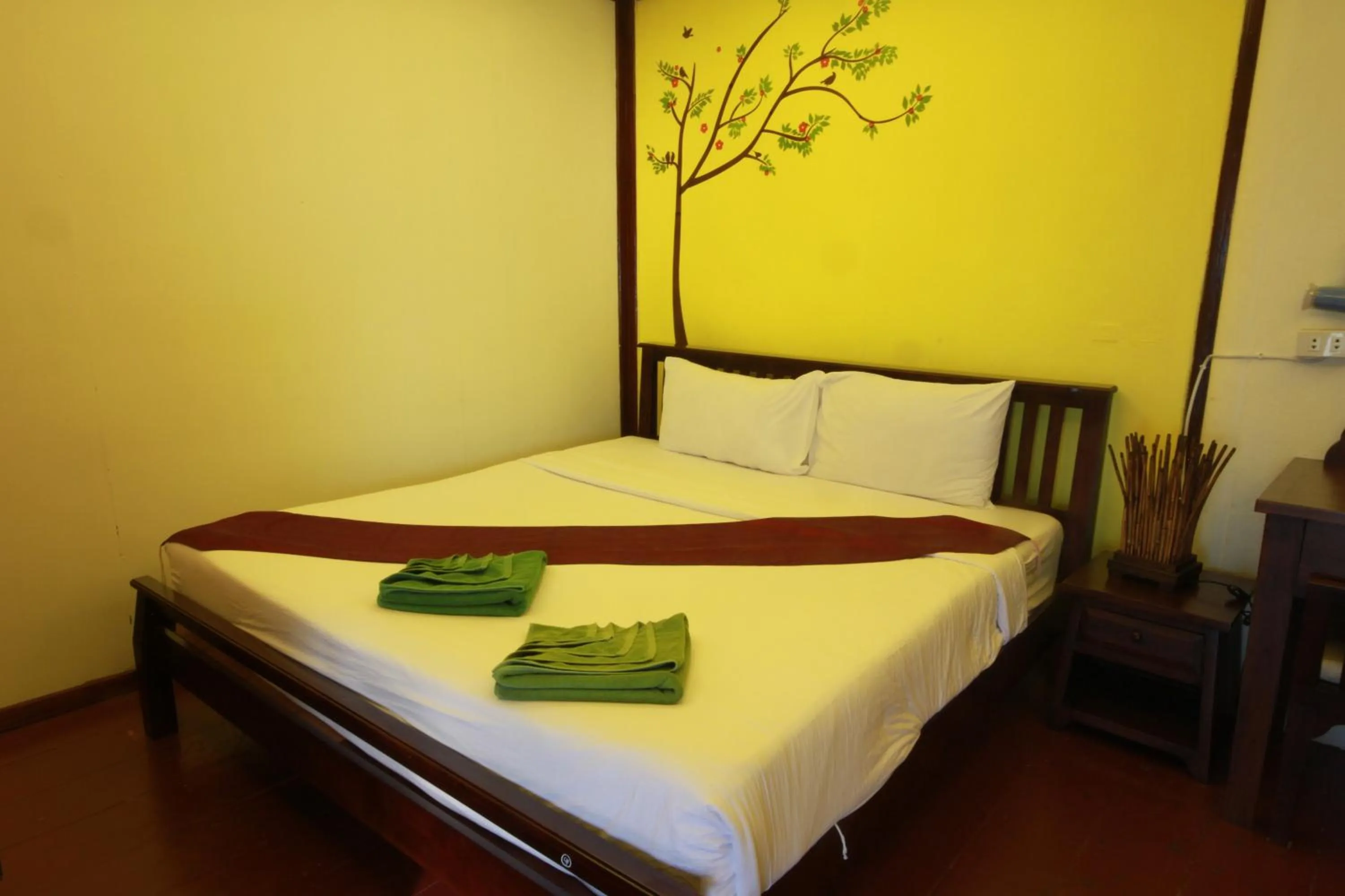 Bed in Tharathip Resort Koh Phangan - SHA Plus