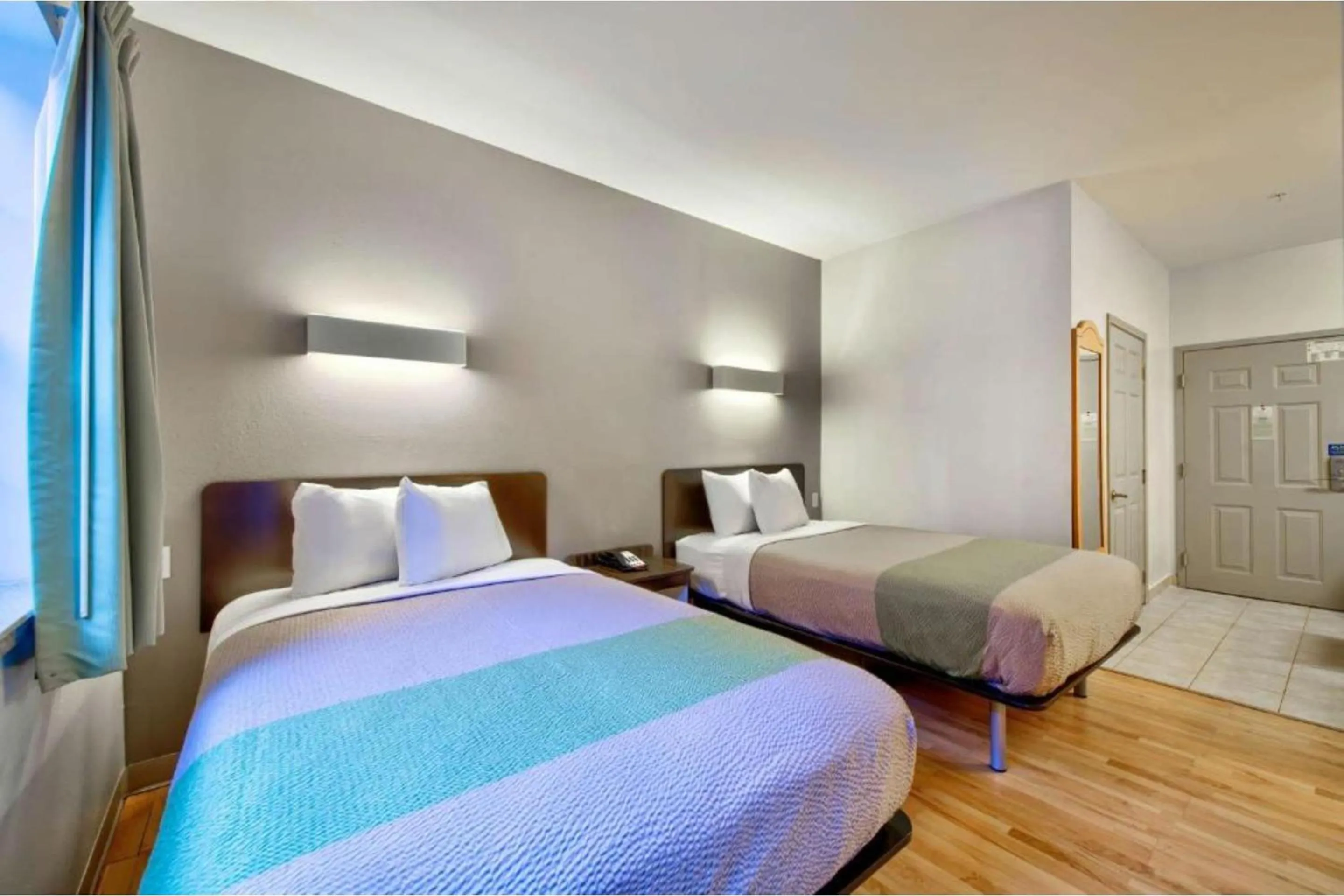 Bedroom, Bed in OYO Townhouse Beaumont Medical Center Area