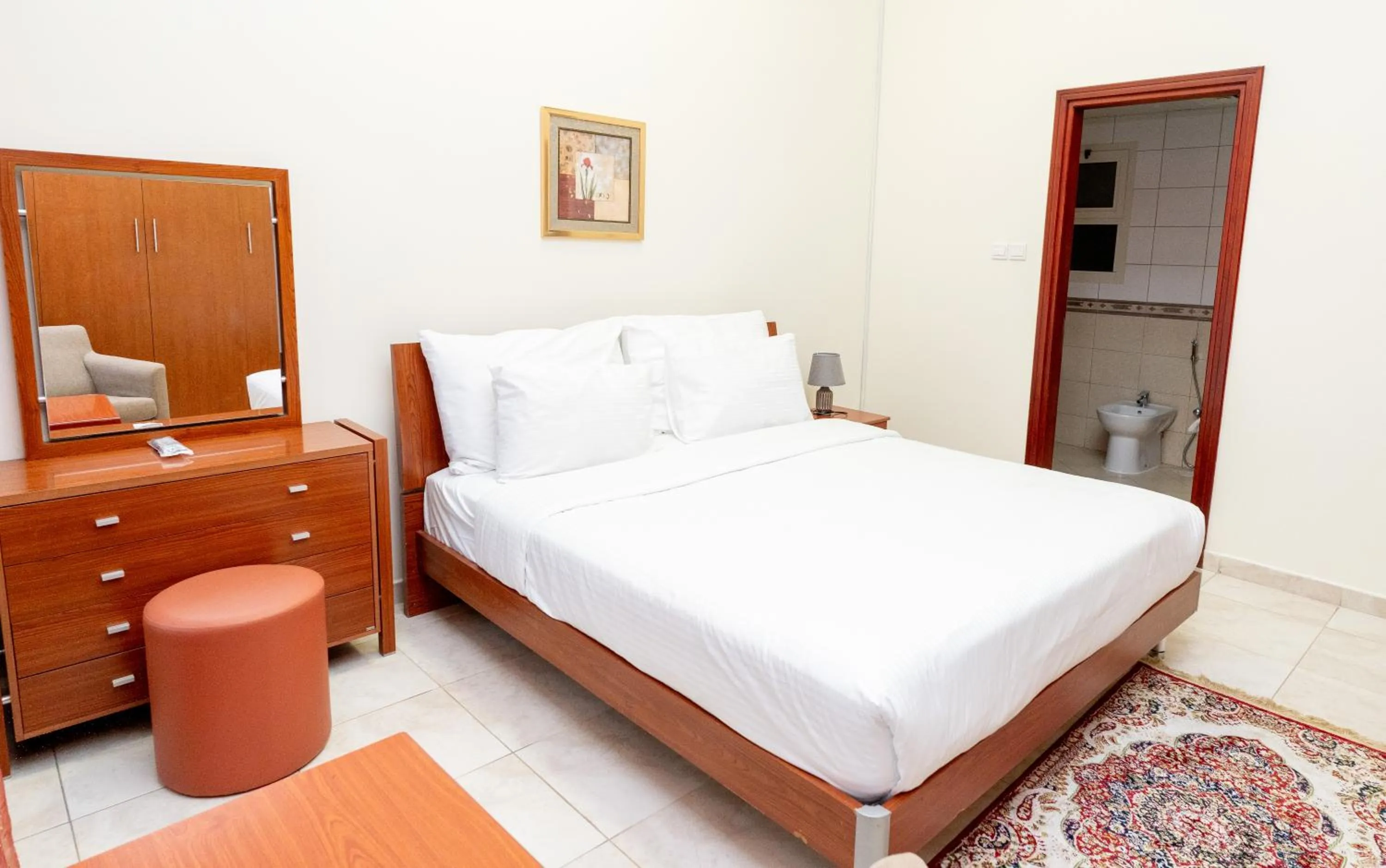 Bedroom, Bed in Al Raya Hotel Apartments
