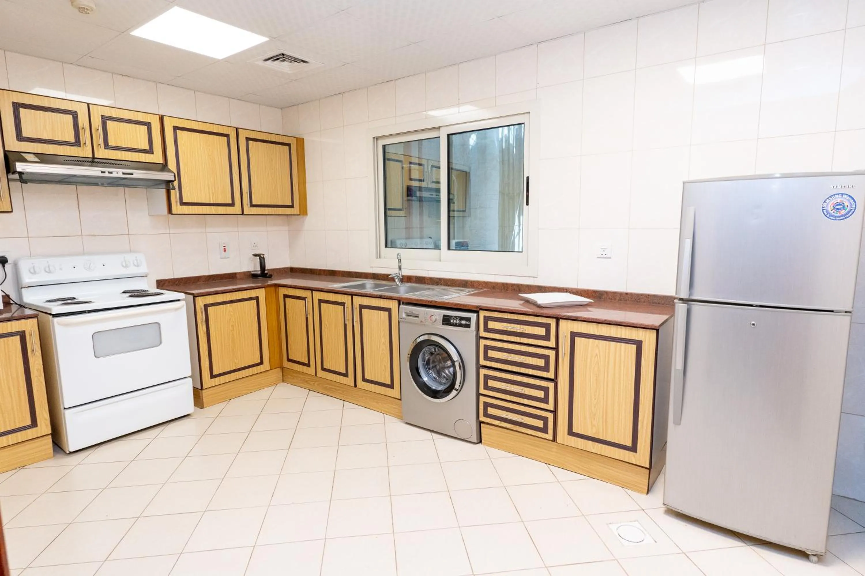 Kitchen or kitchenette in Al Raya Hotel Apartments