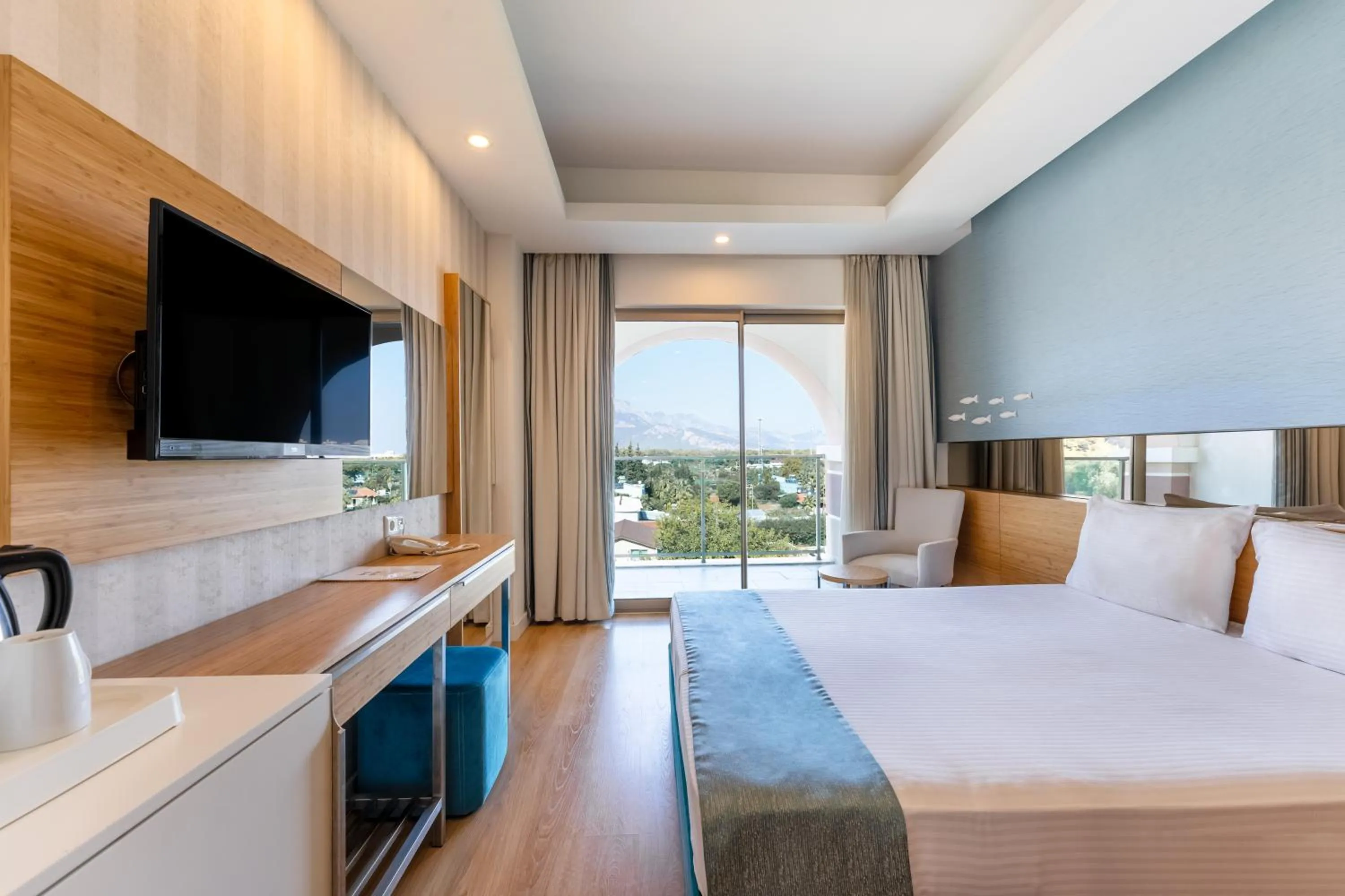 Bed in Dosinia Luxury Resort-Ultra All Inclusive