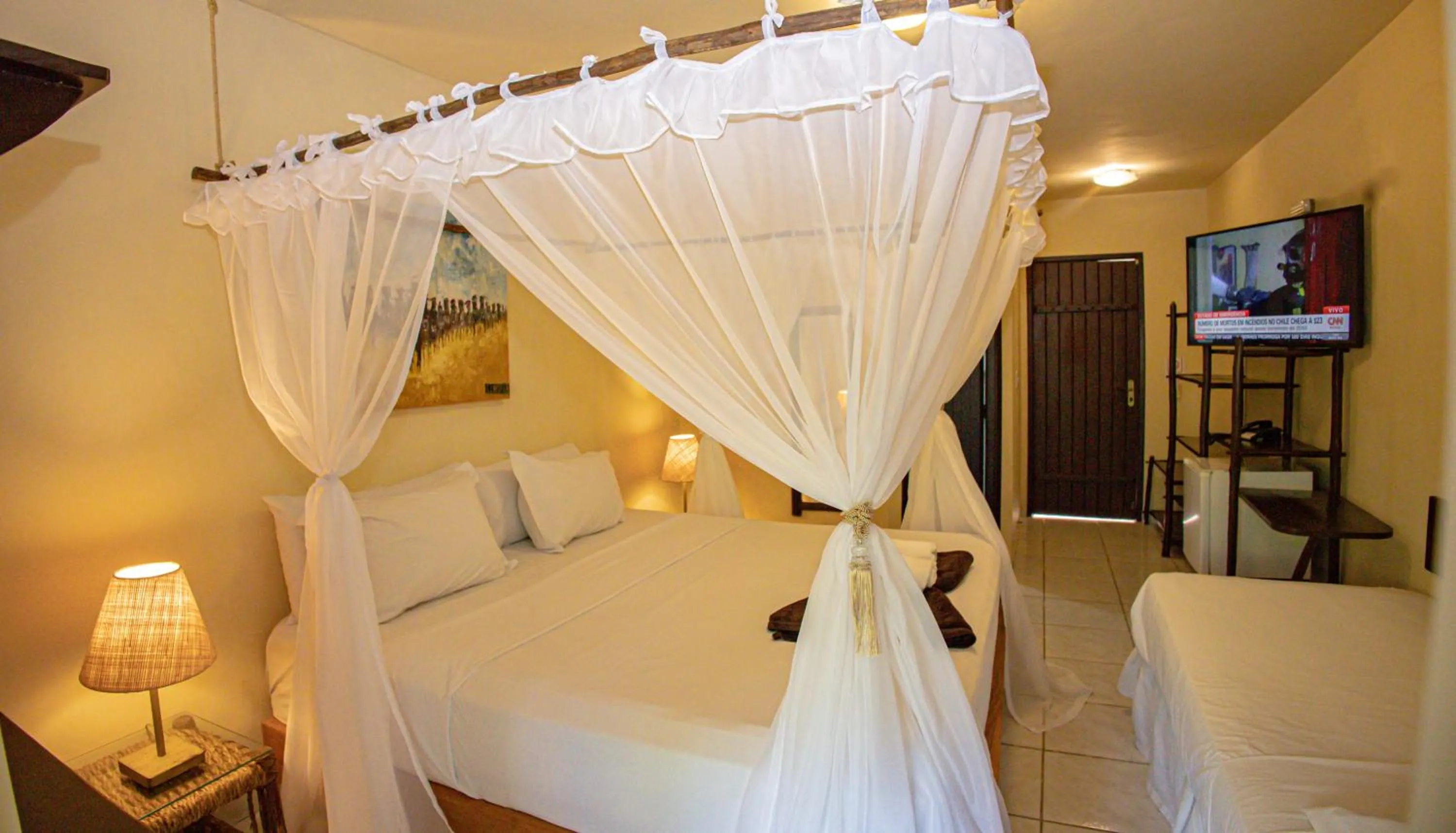 Bed in Pousada Saudosa Maloca